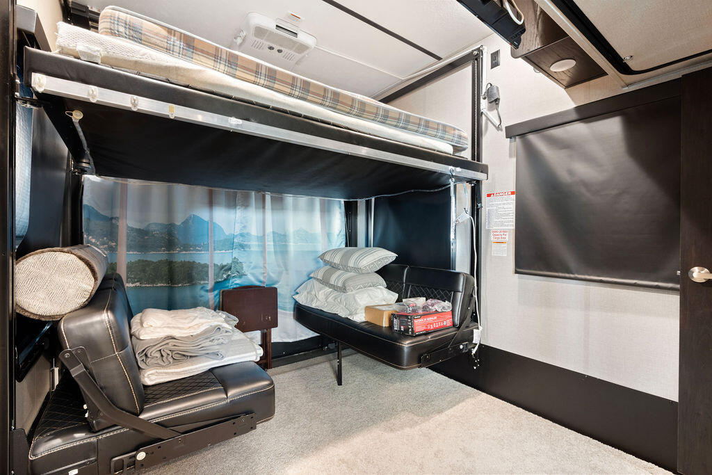 325 Calusa Street, Unit 351 Key Largo, FL 33037 - Photo 16 of 18 a living room with furniture and a flat screen tv