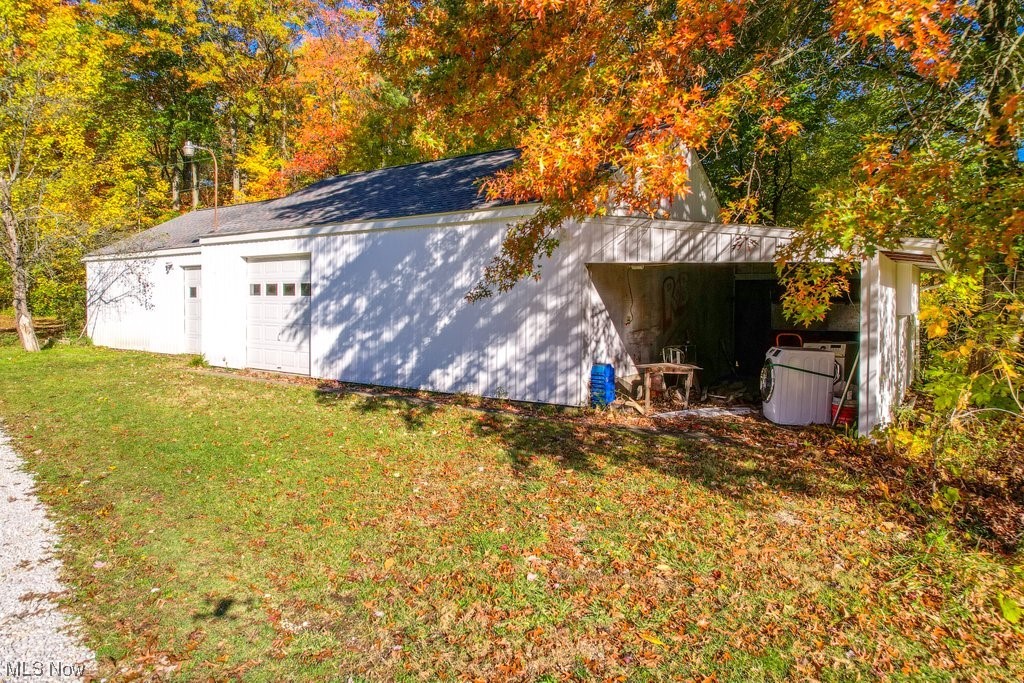 1189 Sandy Lake Road Ravenna, OH 44266 - Photo 10 of 32 View of outdoor structure with a yard
