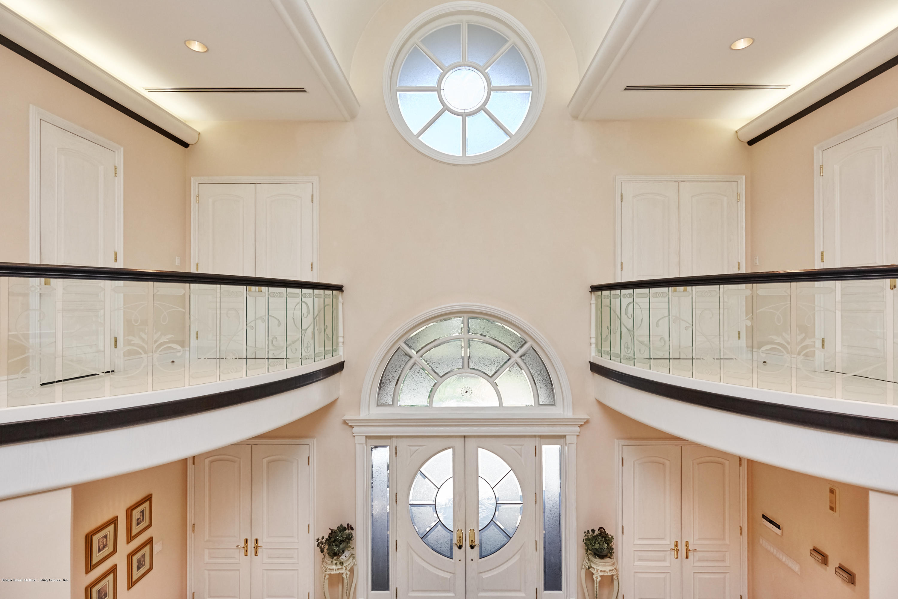 95 Circle Road Staten Island, NY 10304 - Photo 13 of 42 a view of staircase with open entryway