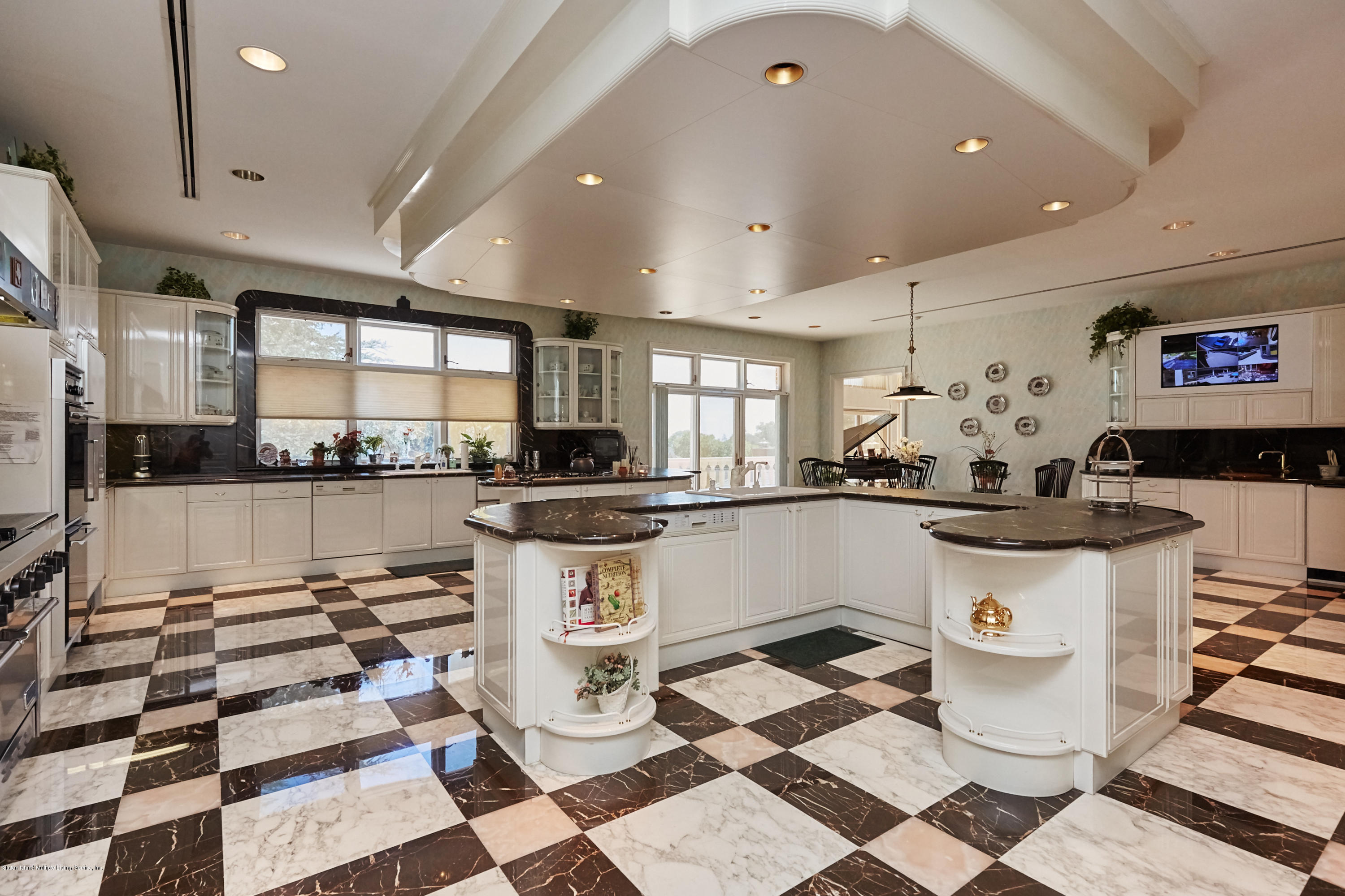 95 Circle Road Staten Island, NY 10304 - Photo 14 of 42 a kitchen with a sink and a stove top oven