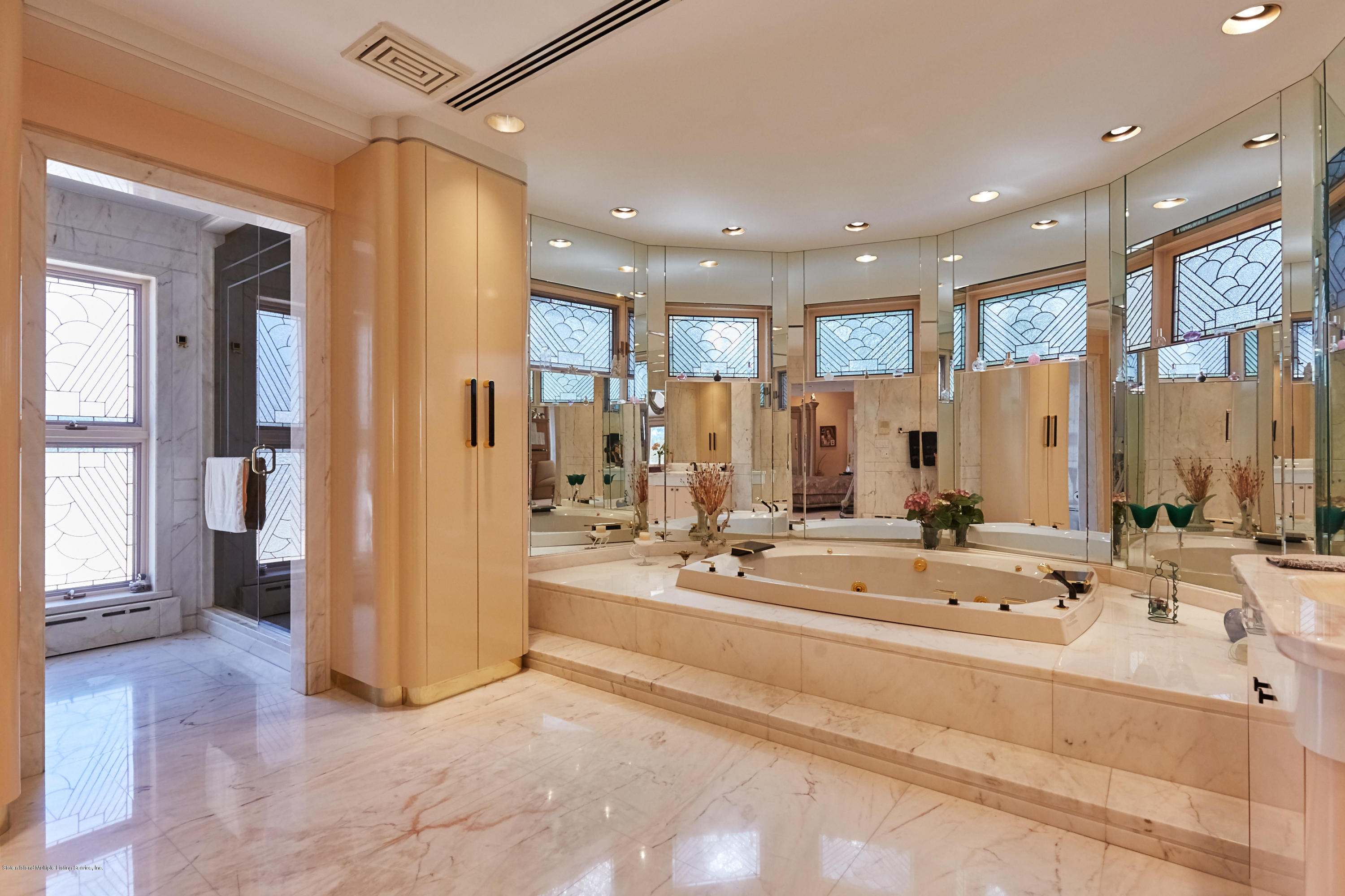 95 Circle Road Staten Island, NY 10304 - Photo 25 of 42 a view of a lobby with furniture and floor to ceiling window
