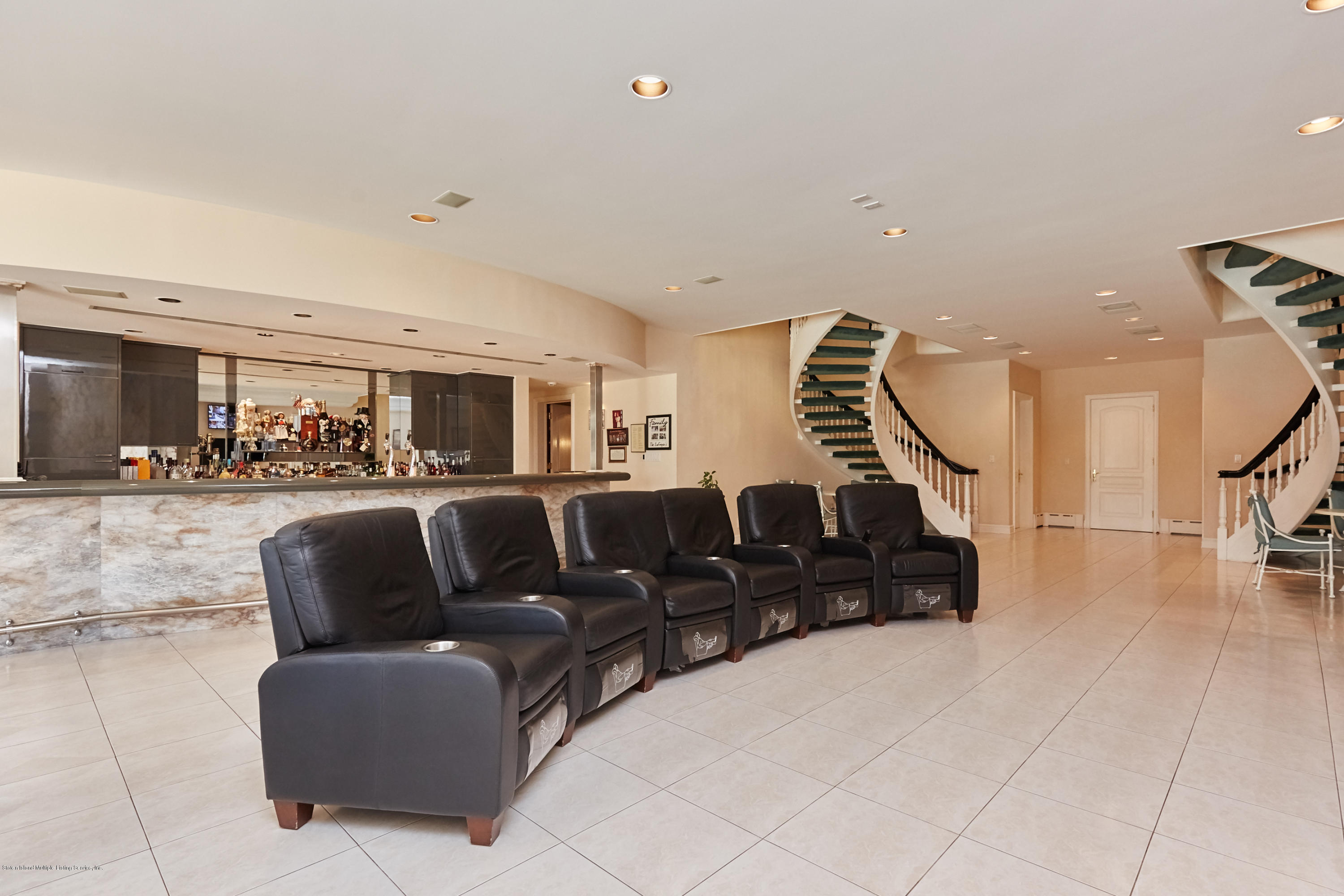 95 Circle Road Staten Island, NY 10304 - Photo 31 of 42 a living room with furniture and wooden floor