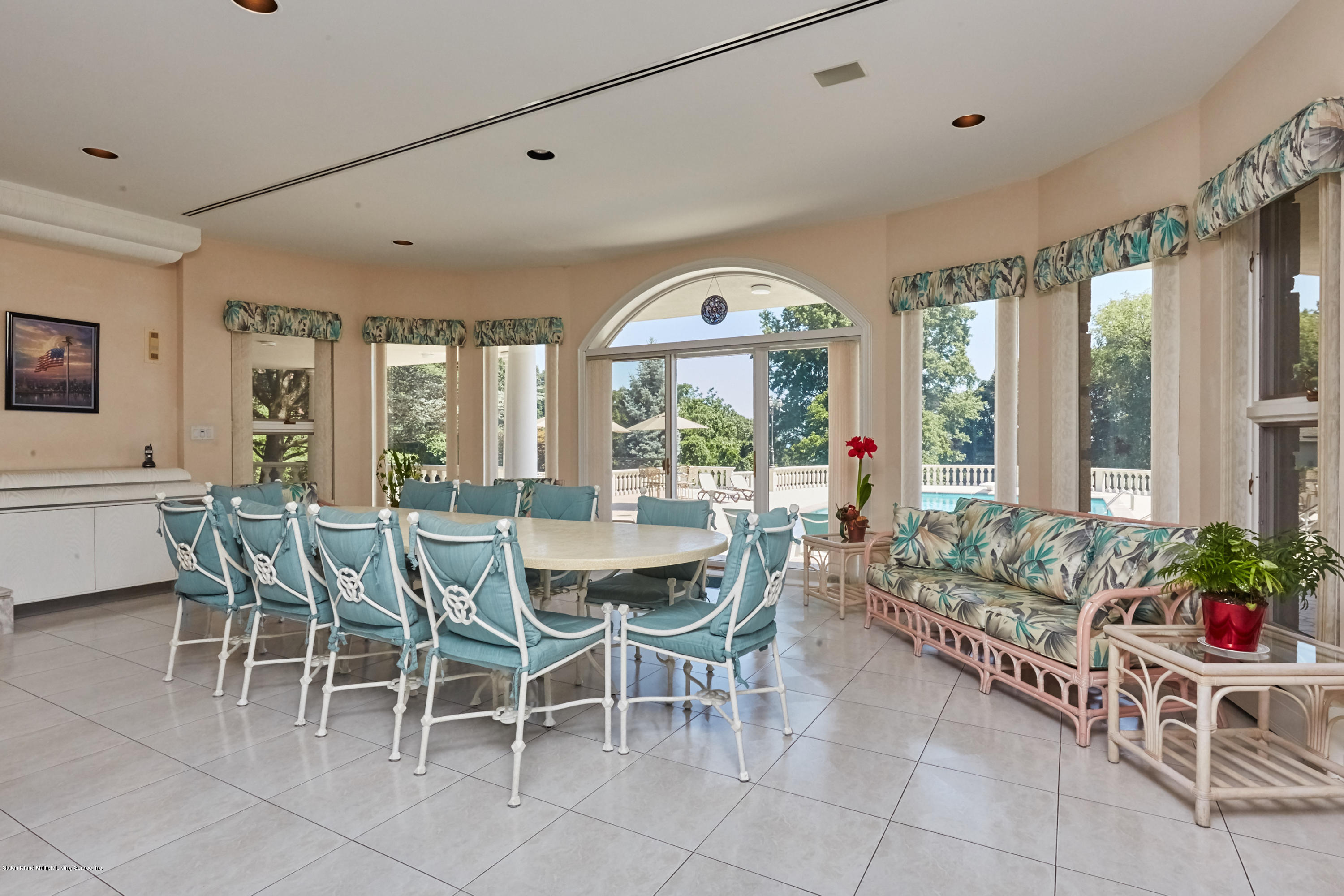 95 Circle Road Staten Island, NY 10304 - Photo 32 of 42 a view of a dining room with furniture window and outside view