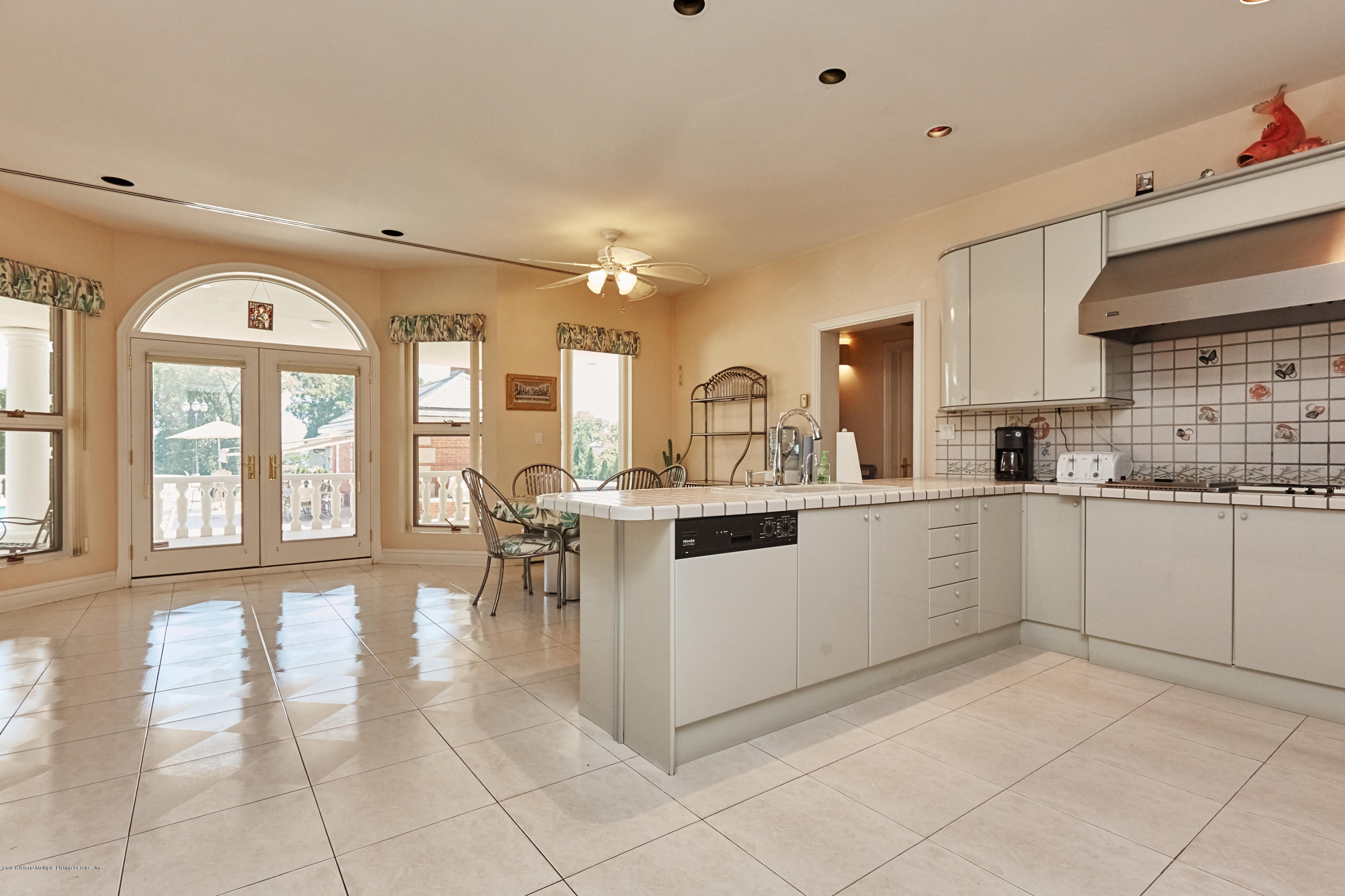 95 Circle Road Staten Island, NY 10304 - Photo 33 of 42 a kitchen with a sink and cabinets