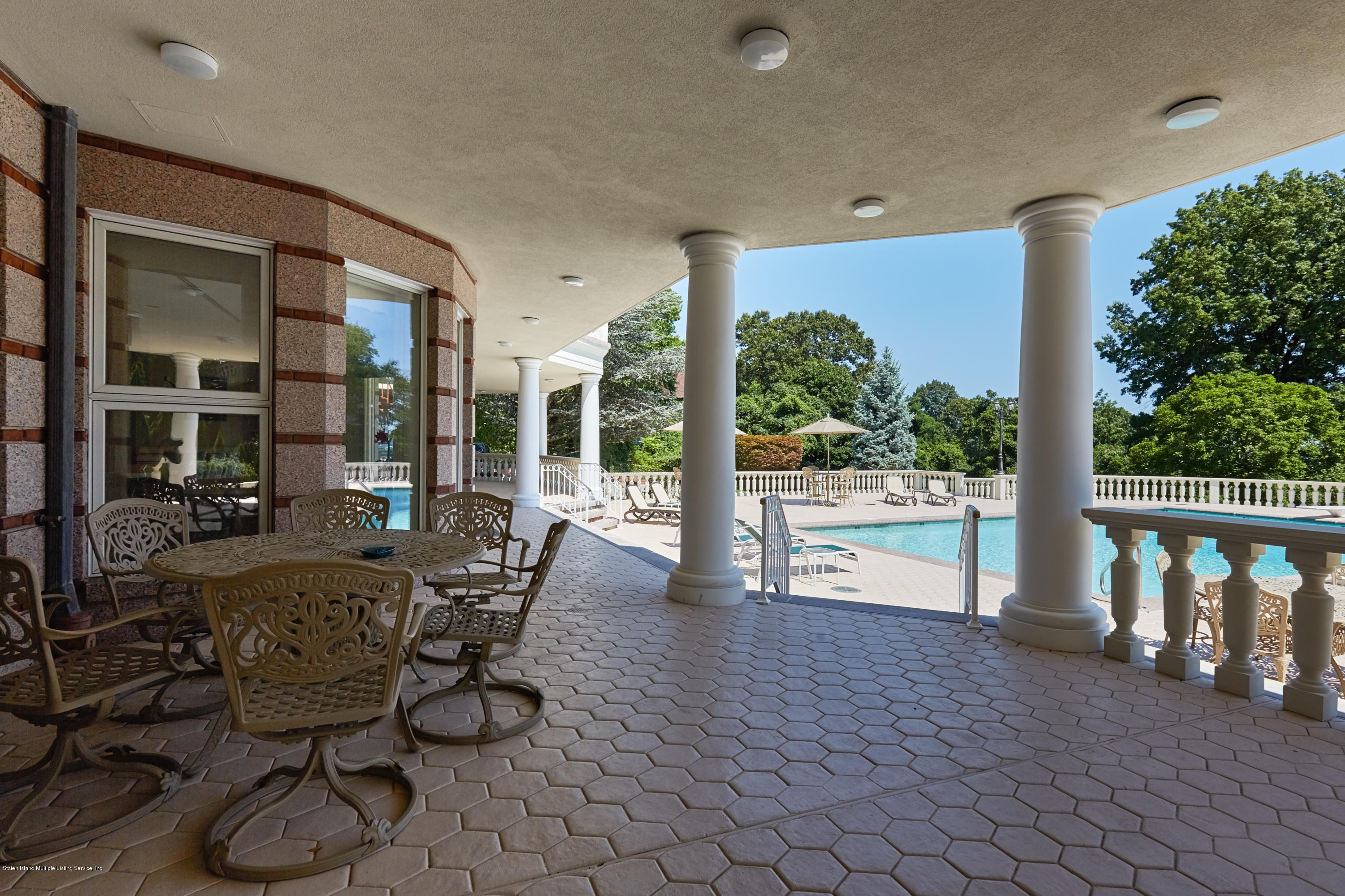 95 Circle Road Staten Island, NY 10304 - Photo 34 of 42 a view of a porch with chairs and backyard