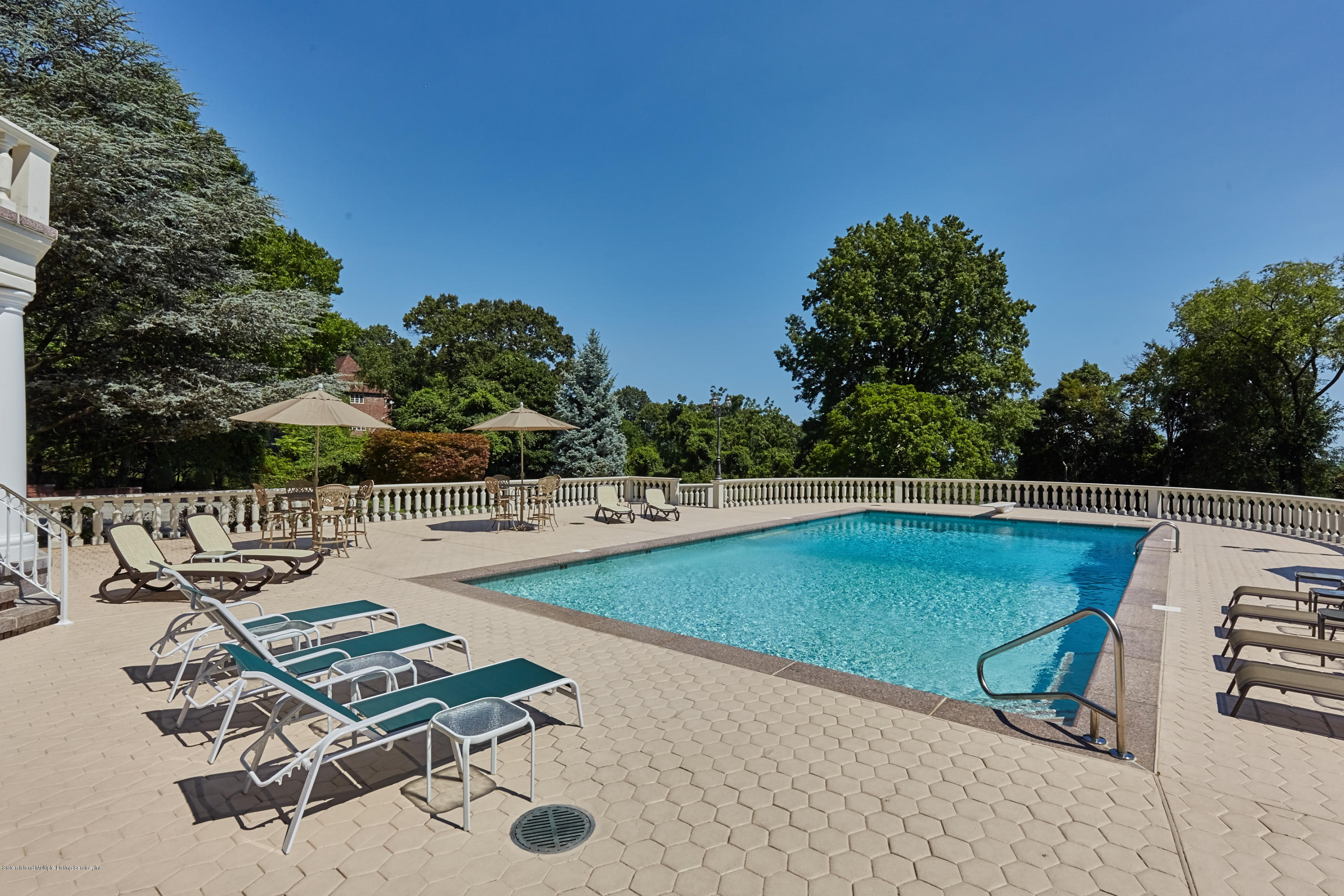 95 Circle Road Staten Island, NY 10304 - Photo 38 of 42 a view of swimming pool with chairs