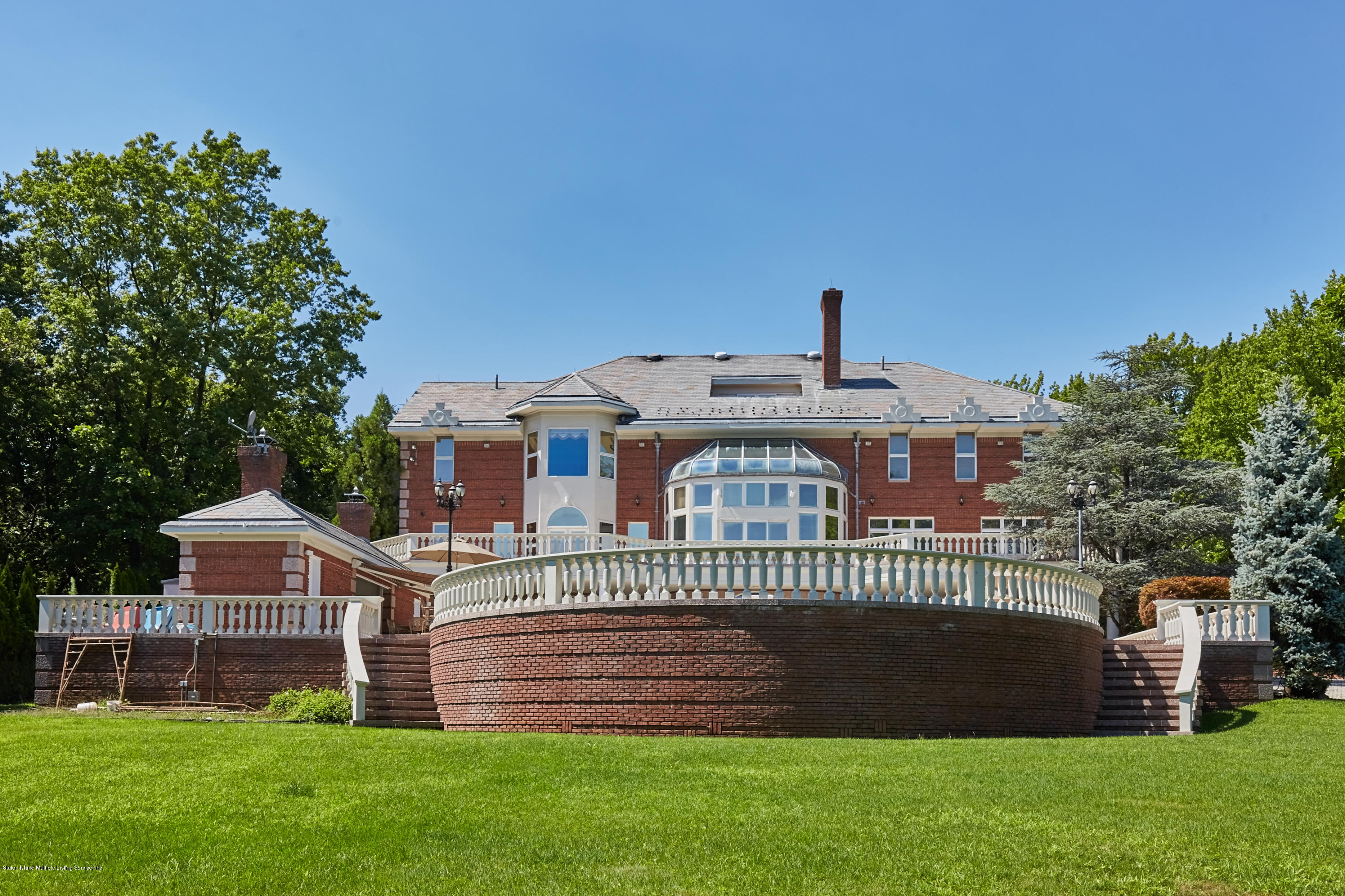 95 Circle Road Staten Island, NY 10304 - Photo 40 of 42 a front view of a house with a yard