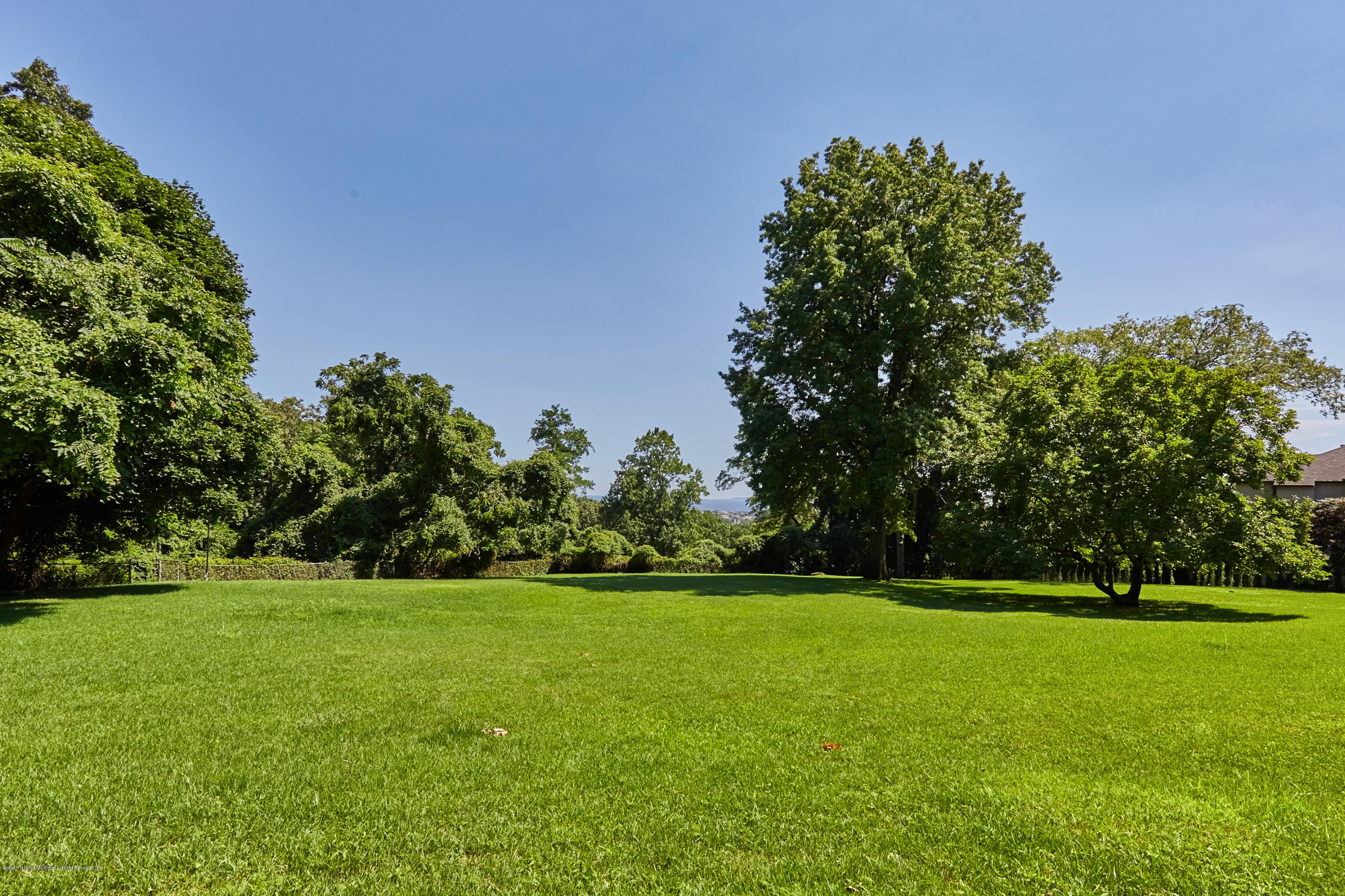 95 Circle Road Staten Island, NY 10304 - Photo 42 of 42 a view of a field with trees in the background