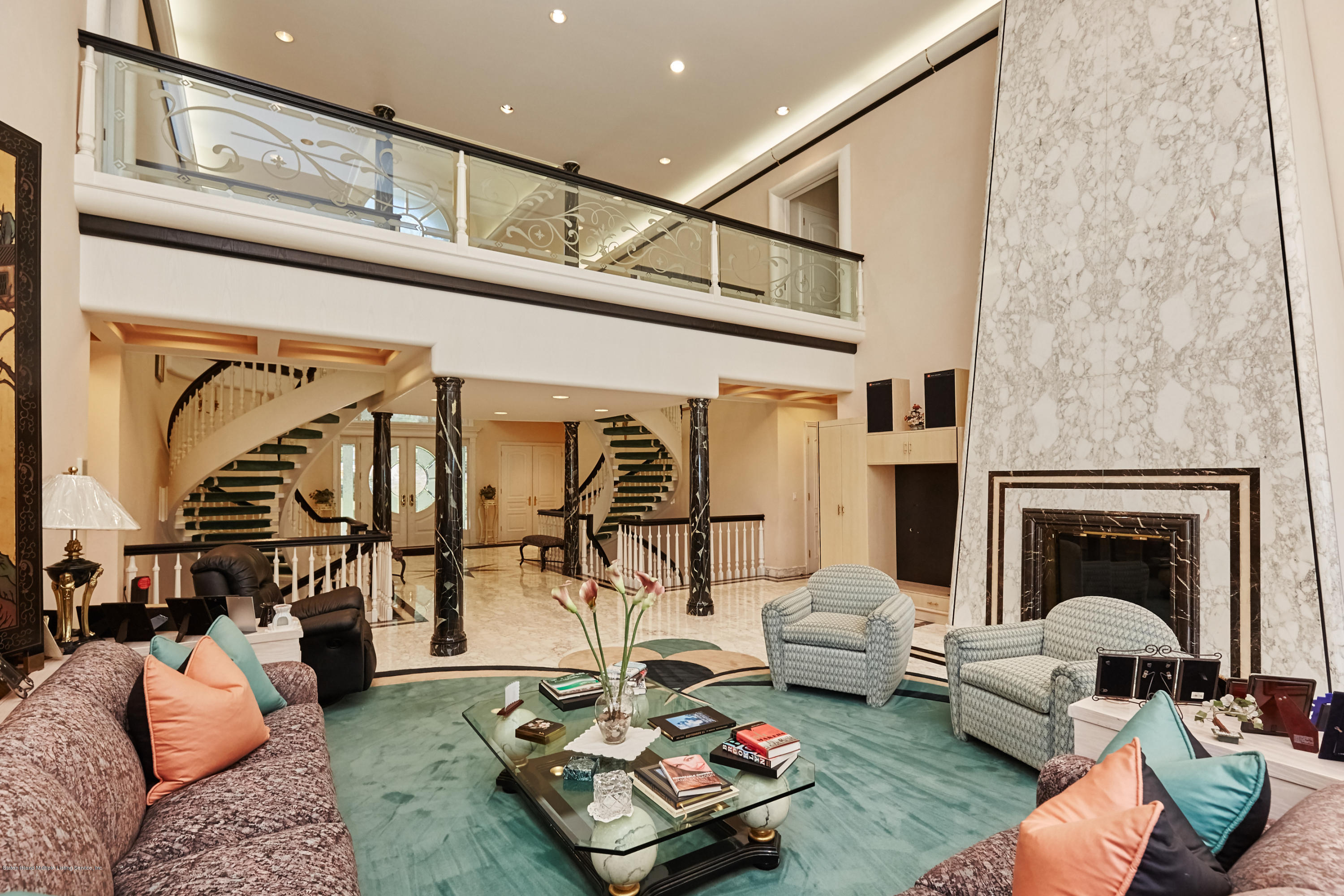 95 Circle Road Staten Island, NY 10304 - Photo 9 of 42 a living room with furniture and a ceiling fan