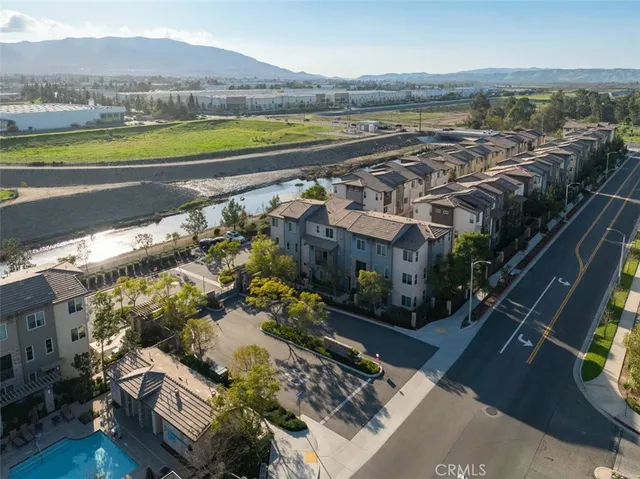 a view of a city with lawn chairs