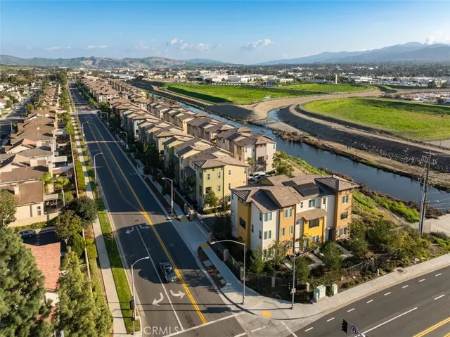 a view of a city with an ocean view
