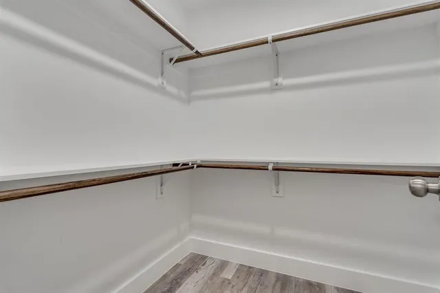 a view of a room with racks on the wall