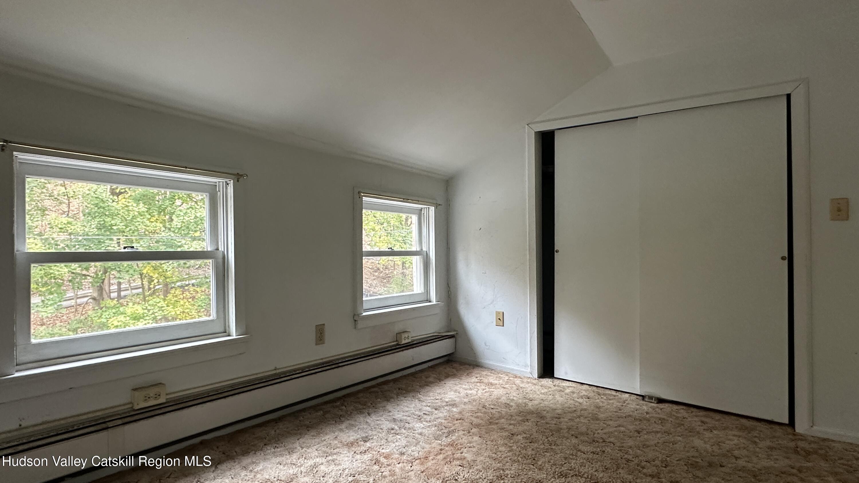 7 River Road, Unit TOWN ROAD Highland, NY 12528 - Photo 14 of 25 a view of an empty room and window