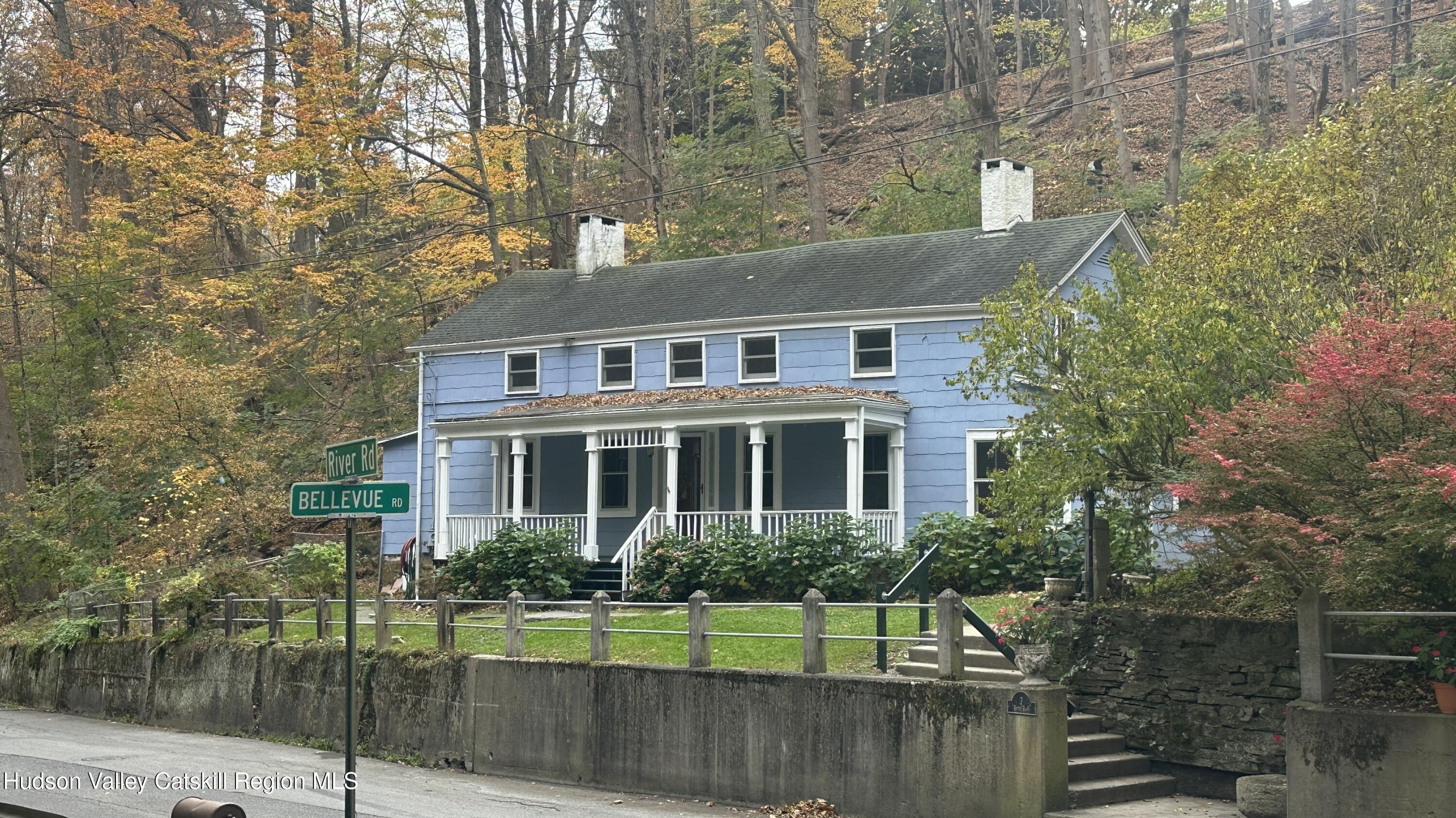7 River Road, Unit TOWN ROAD Highland, NY 12528 - Photo 21 of 25 front view of a house with a yard