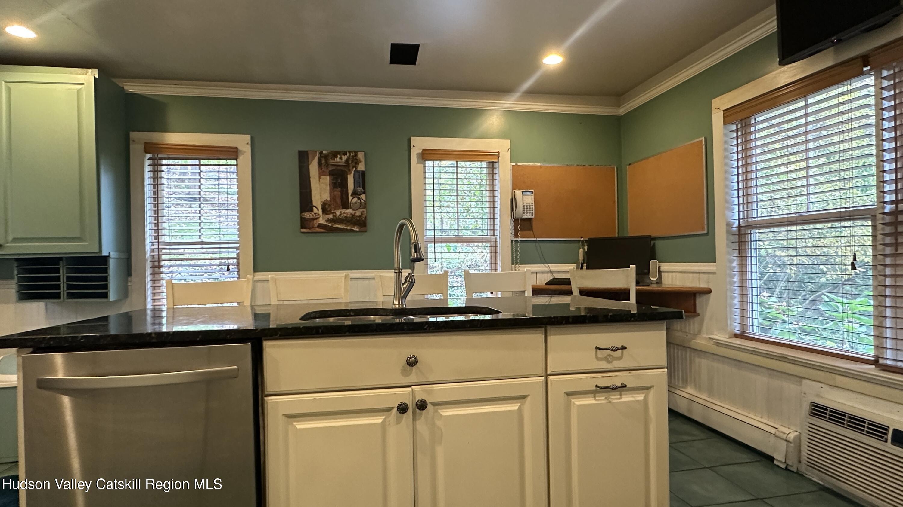 7 River Road, Unit TOWN ROAD Highland, NY 12528 - Photo 22 of 25 a kitchen with stainless steel appliances granite countertop a sink and a window