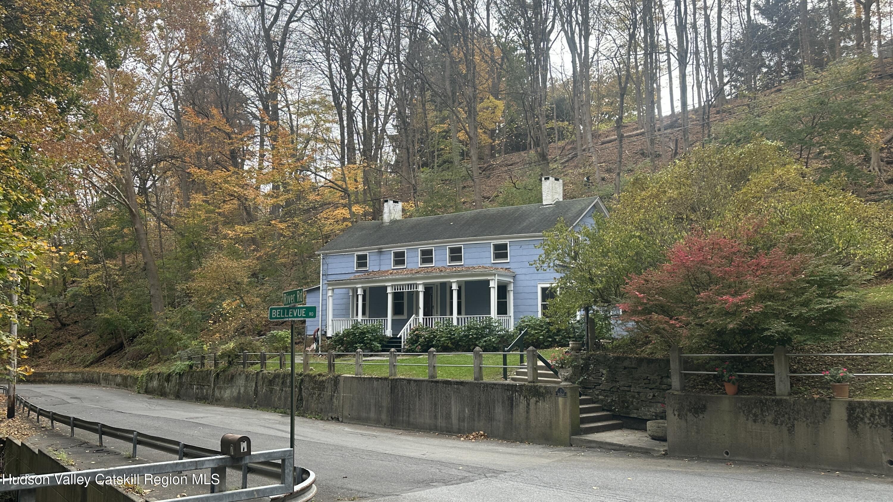 7 River Road, Unit TOWN ROAD Highland, NY 12528 - Photo 24 of 25 a front view of a house with a yard