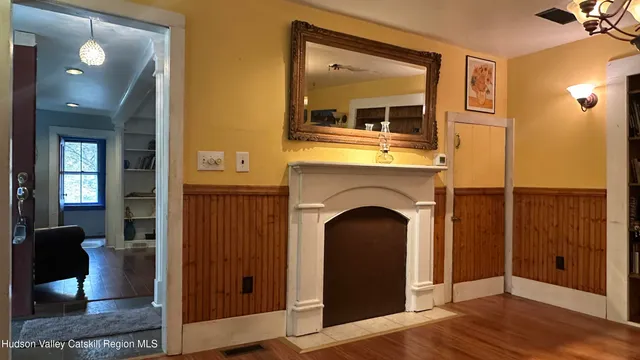 a view of an entryway with a fireplace