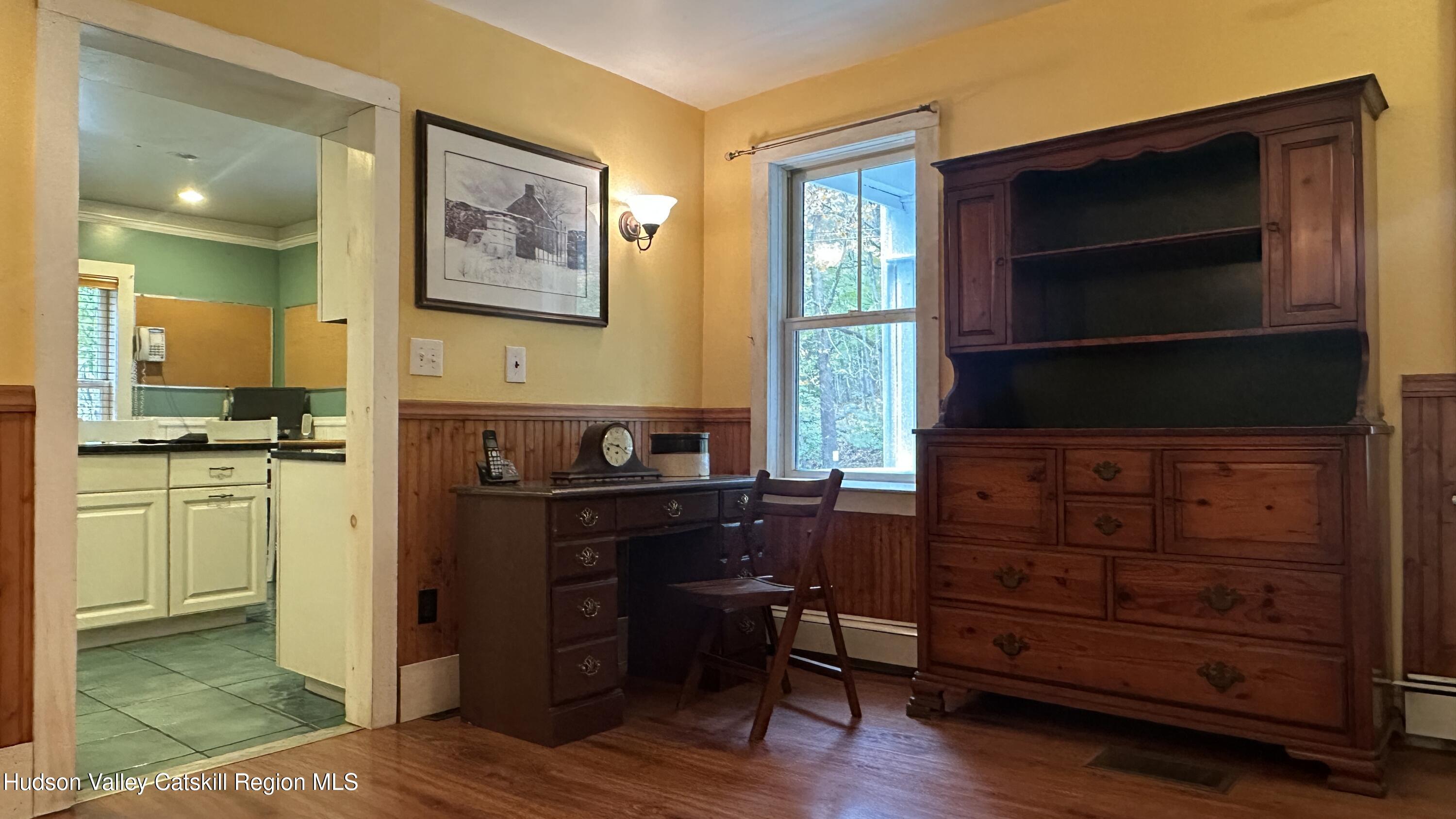 7 River Road, Unit TOWN ROAD Highland, NY 12528 - Photo 6 of 25 a kitchen with a refrigerator and a stove top oven