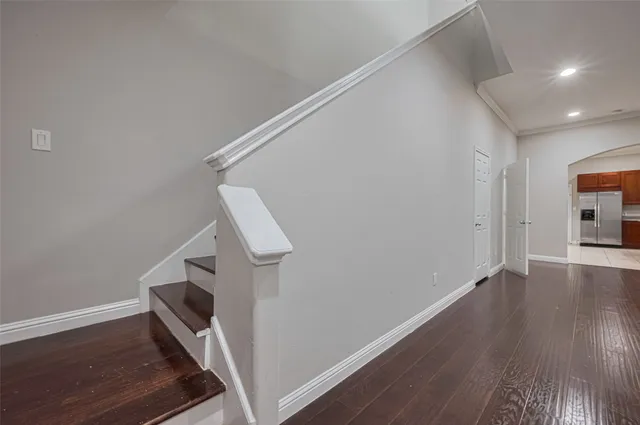 a view of entryway with wooden floor