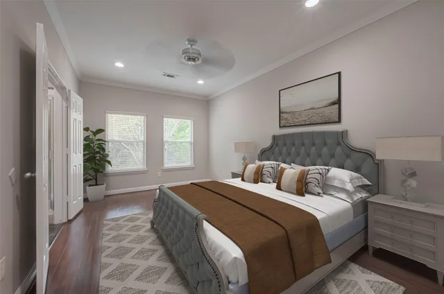 a bedroom with double bed and a window