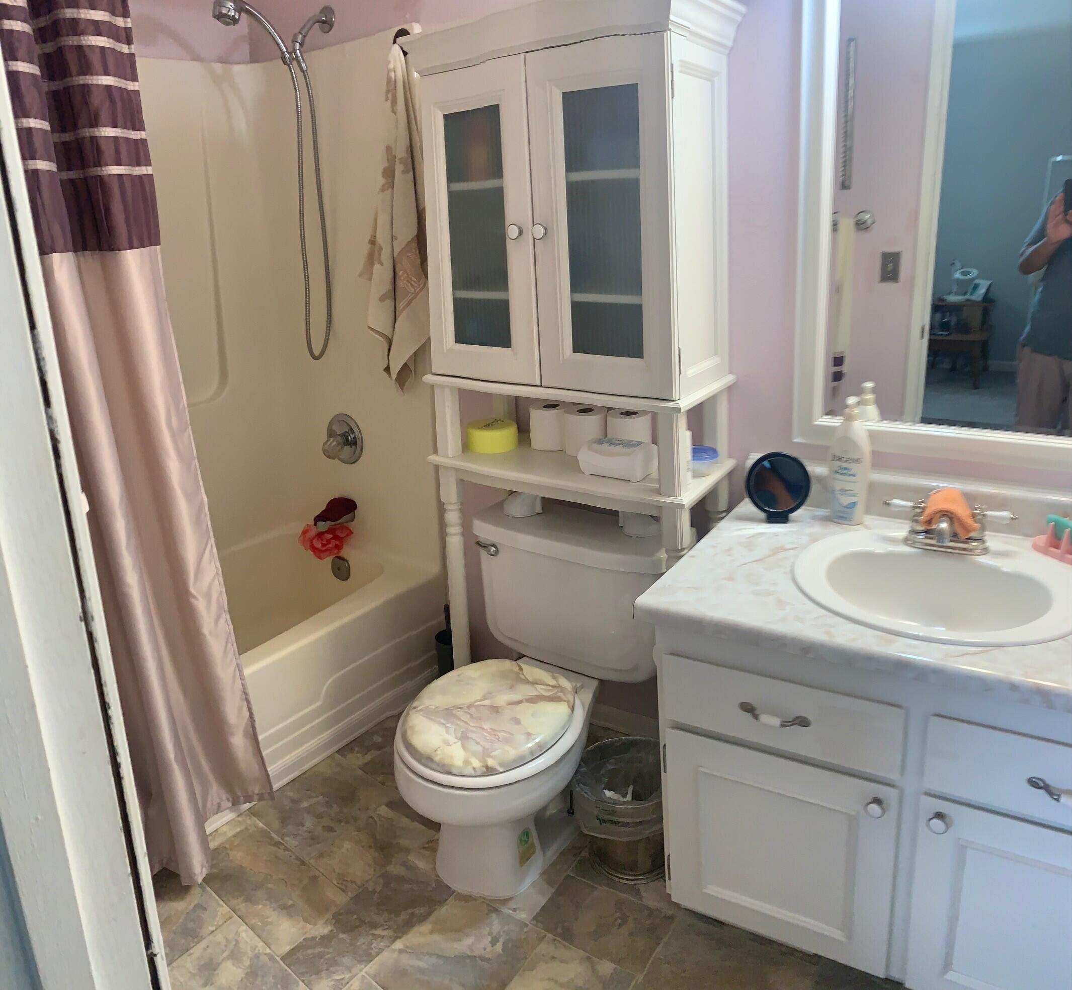 20604 Roff Way Burney, CA 96013 - Photo 26 of 32 a bathroom with a sink toilet and shower