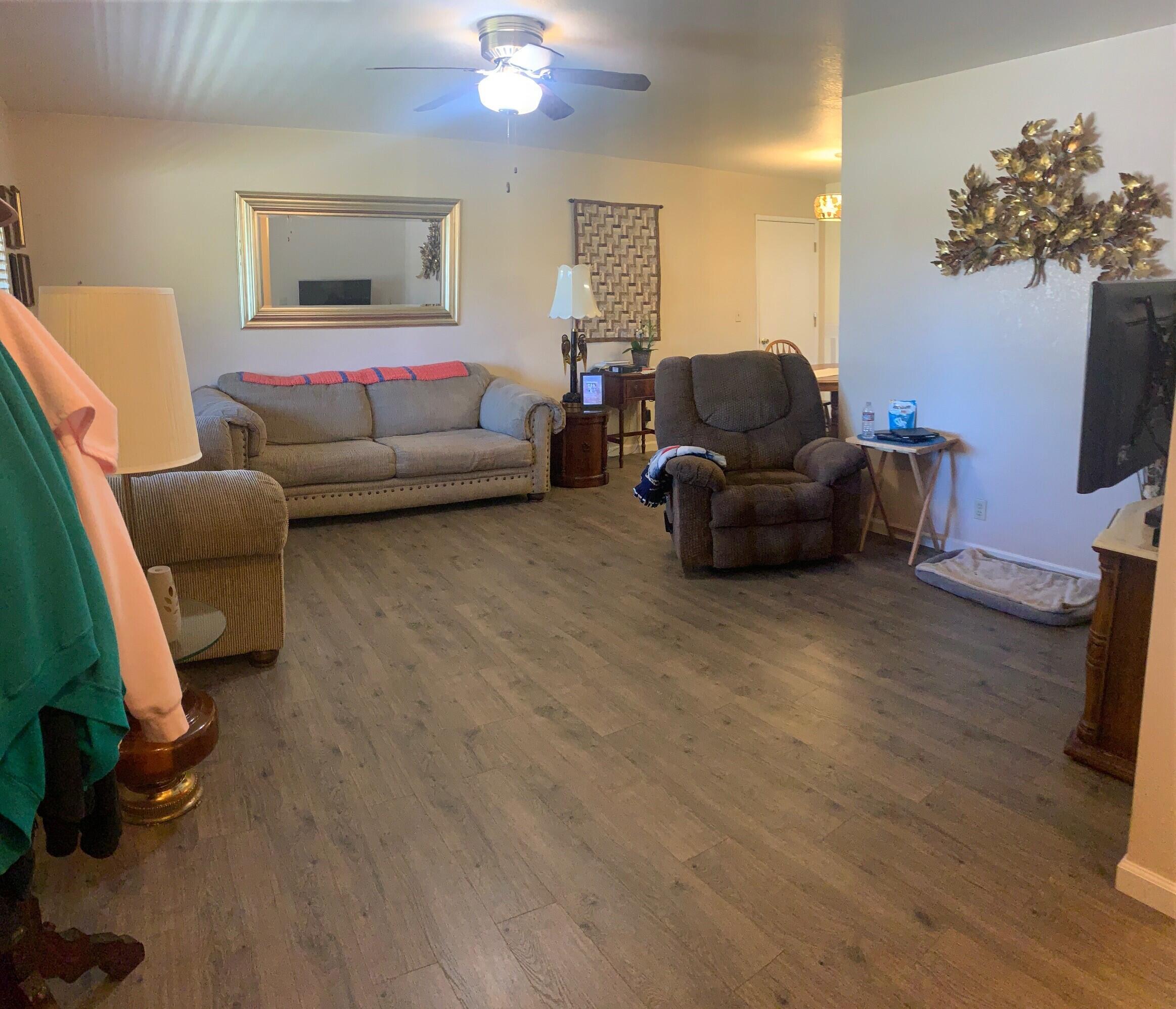20604 Roff Way Burney, CA 96013 - Photo 3 of 32 a living room with furniture and a flat screen tv