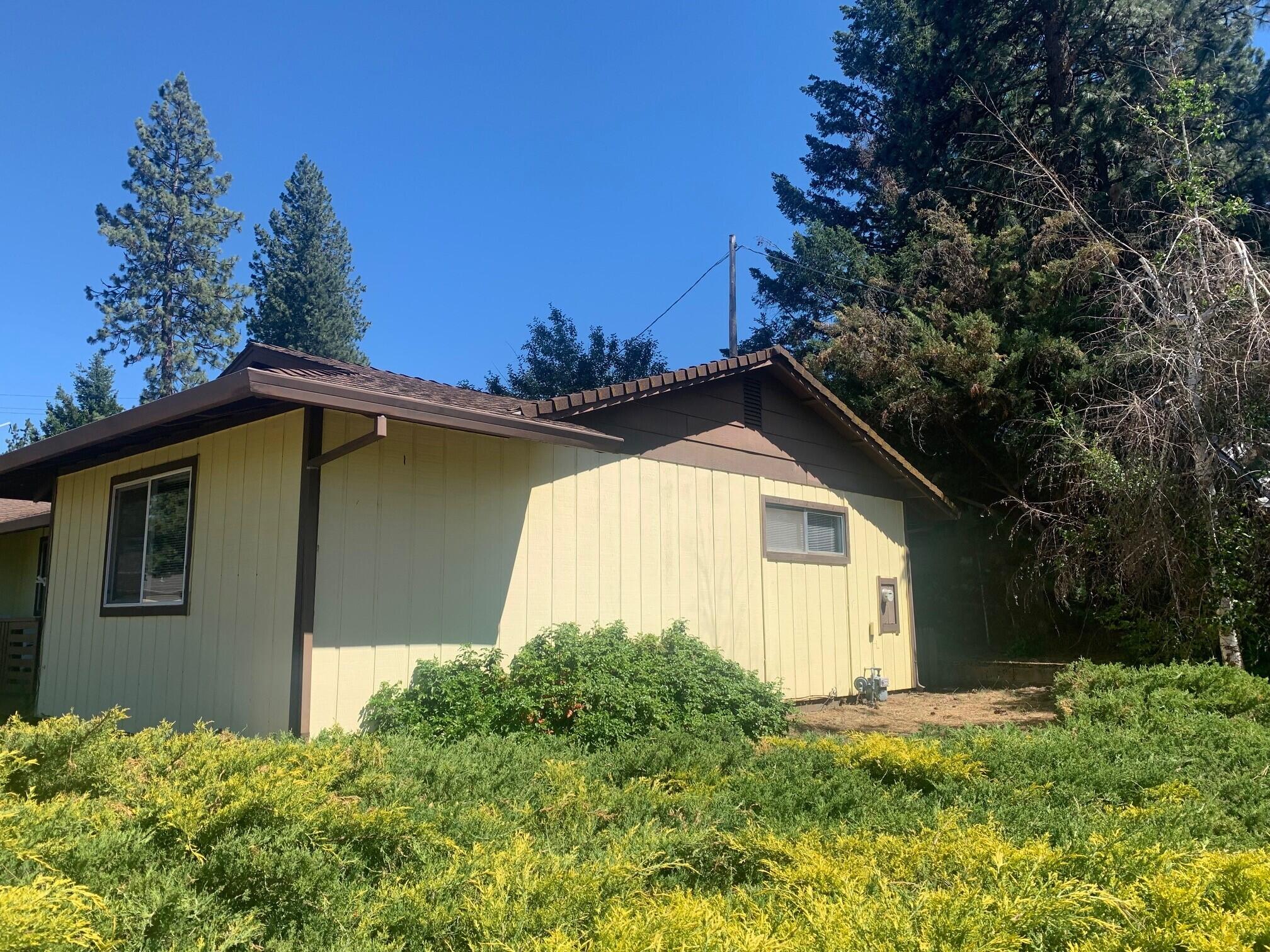 20604 Roff Way Burney, CA 96013 - Photo 32 of 32 a view of a house with a yard