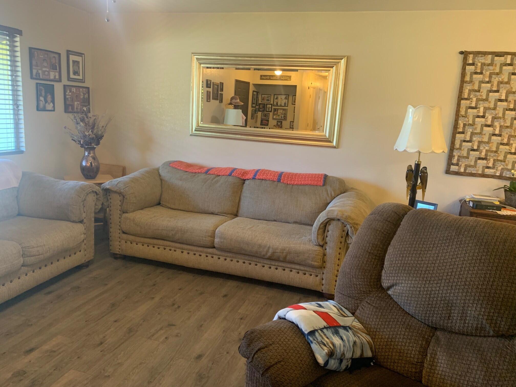 20604 Roff Way Burney, CA 96013 - Photo 5 of 32 a living room with furniture and a couch