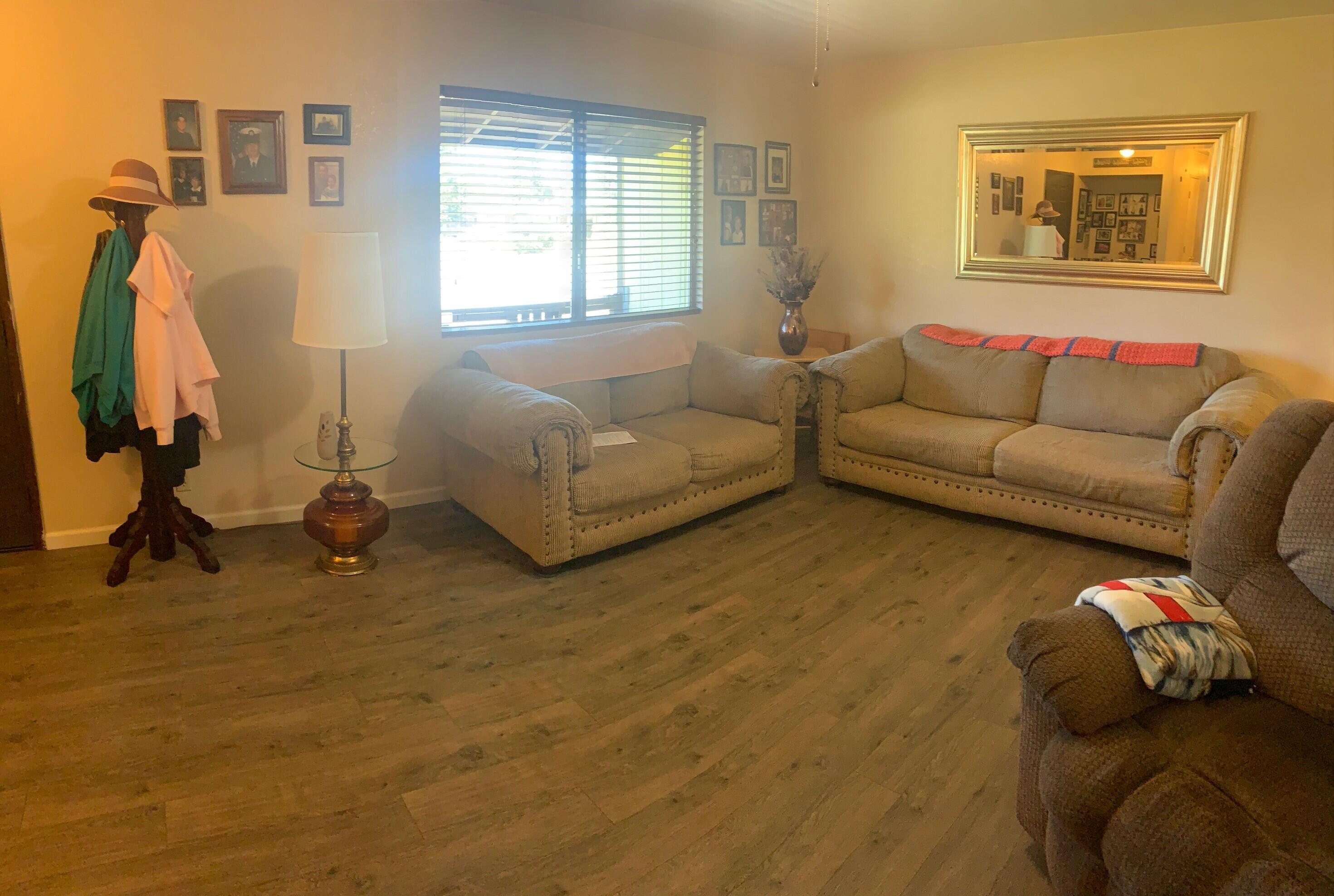 20604 Roff Way Burney, CA 96013 - Photo 6 of 32 a living room with furniture and a window