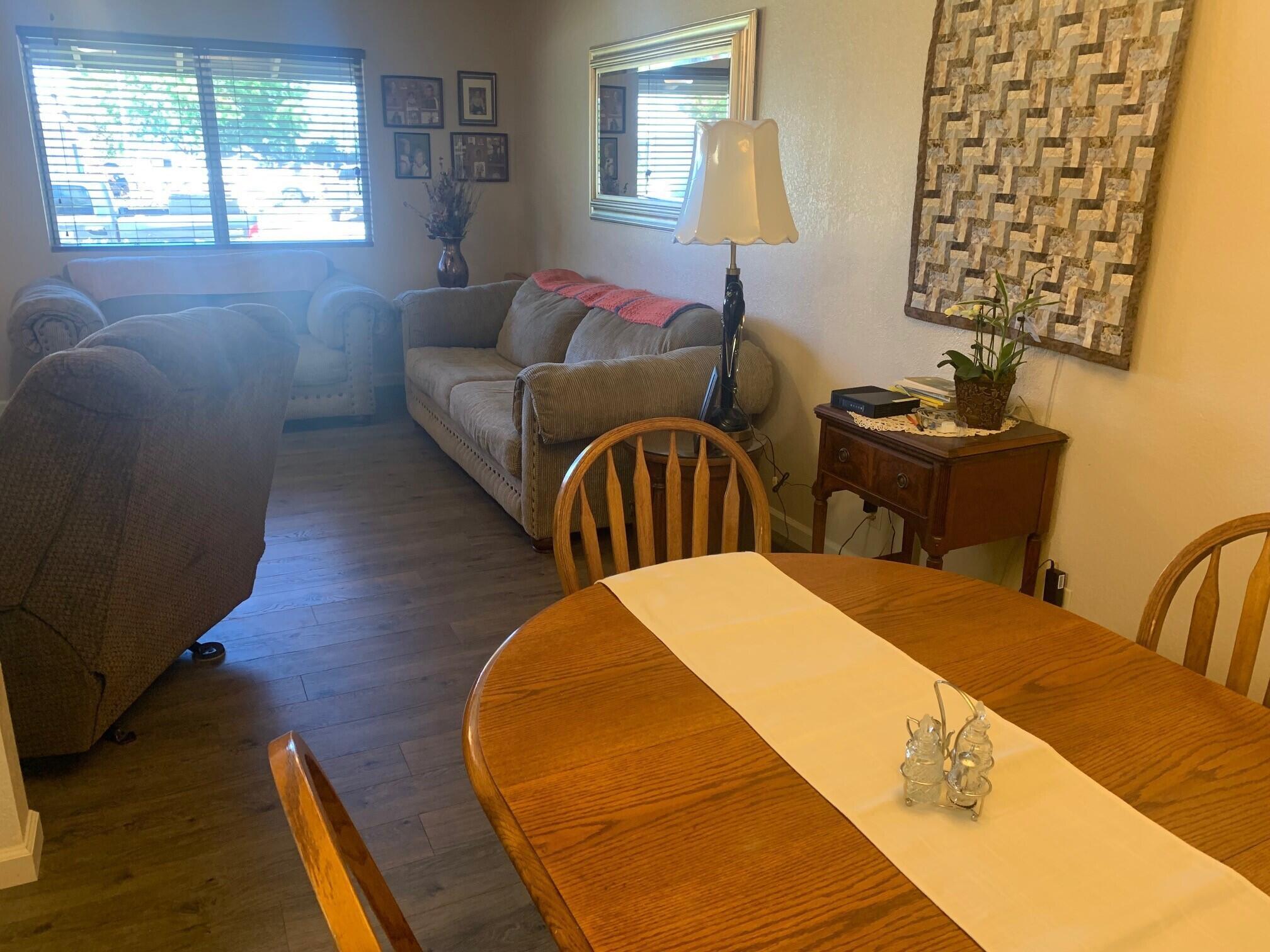20604 Roff Way Burney, CA 96013 - Photo 9 of 32 a living room with furniture and a window