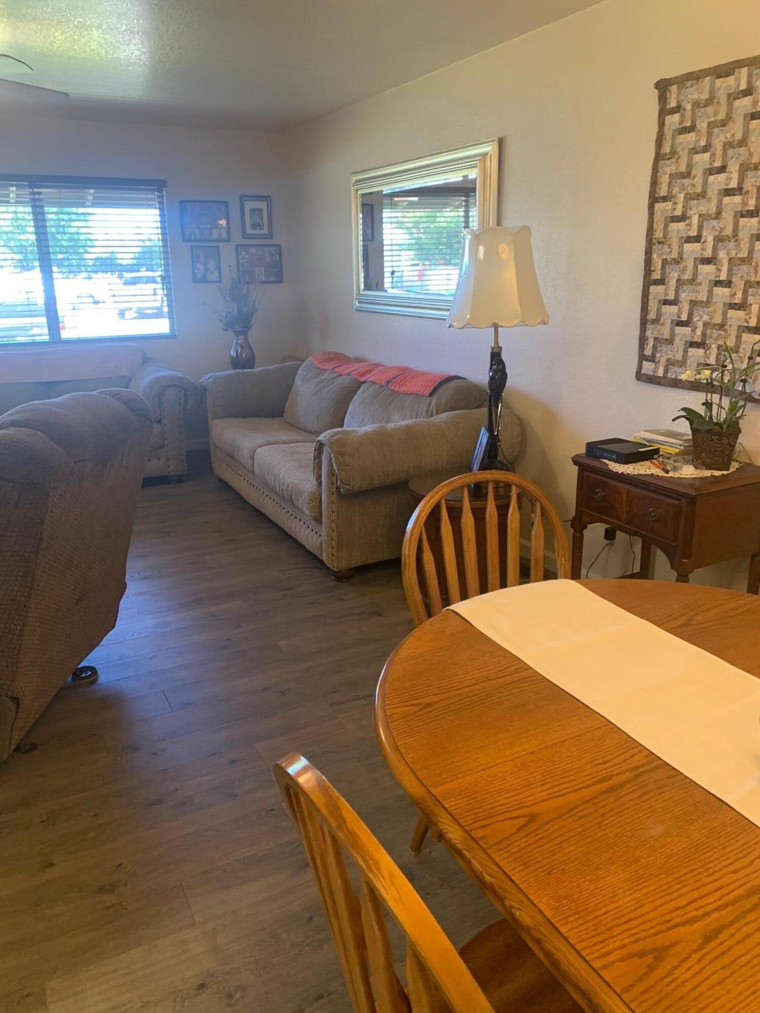 20604 Roff Way Burney, CA 96013 - Photo 10 of 32 a bedroom with two beds and a dresser next to a window