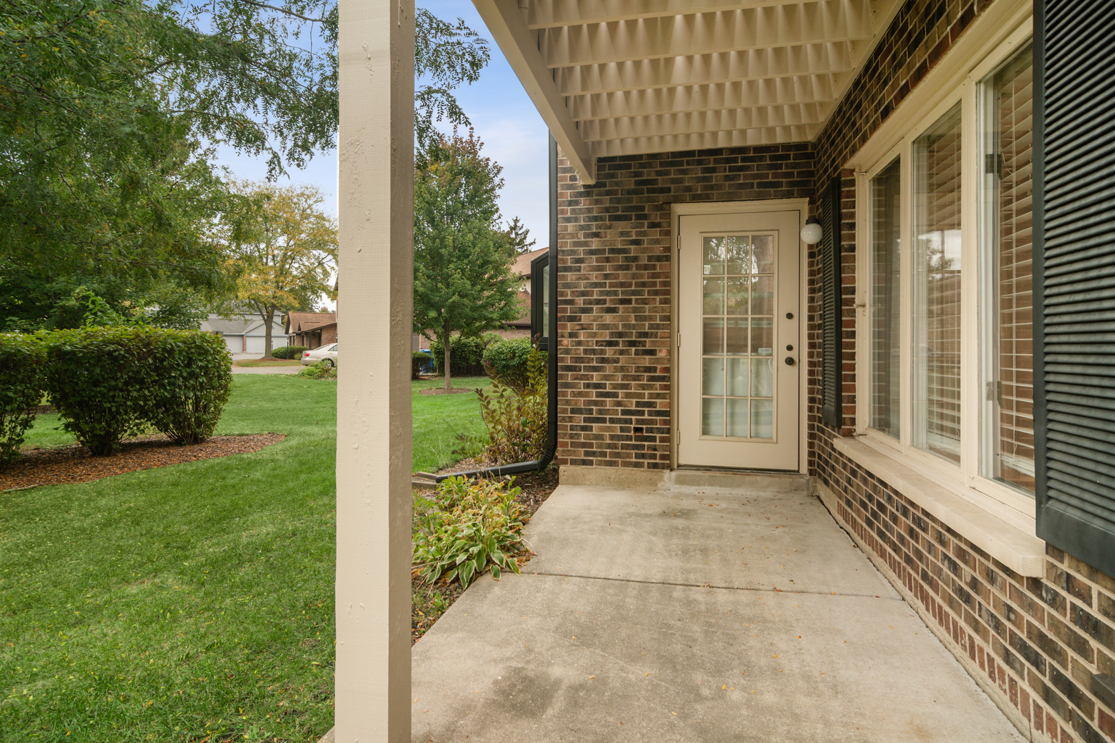 184 Grove Avenue, Unit B Des Plaines, IL 60016 - Photo 19 of 20 a front view of a house with a yard