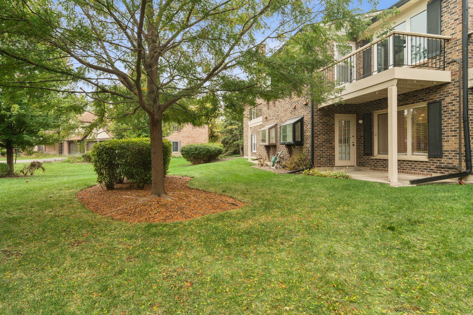 184 Grove Avenue, Unit B Des Plaines, IL 60016 - Photo 20 of 20 a view of a house with a yard