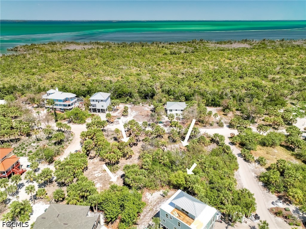 4430 Conch Shell Drive Upper Captiva, FL 33924 - Photo 1 of 32 a view of a yard with an outdoor space