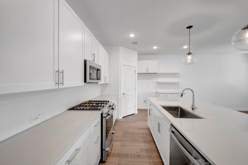 7914 Jasper Mdws Way Angleton, TX 77515 - Photo 15 of 33 another view of kitchen