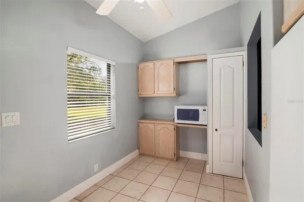 a kitchen with stainless steel appliances a refrigerator and a stove