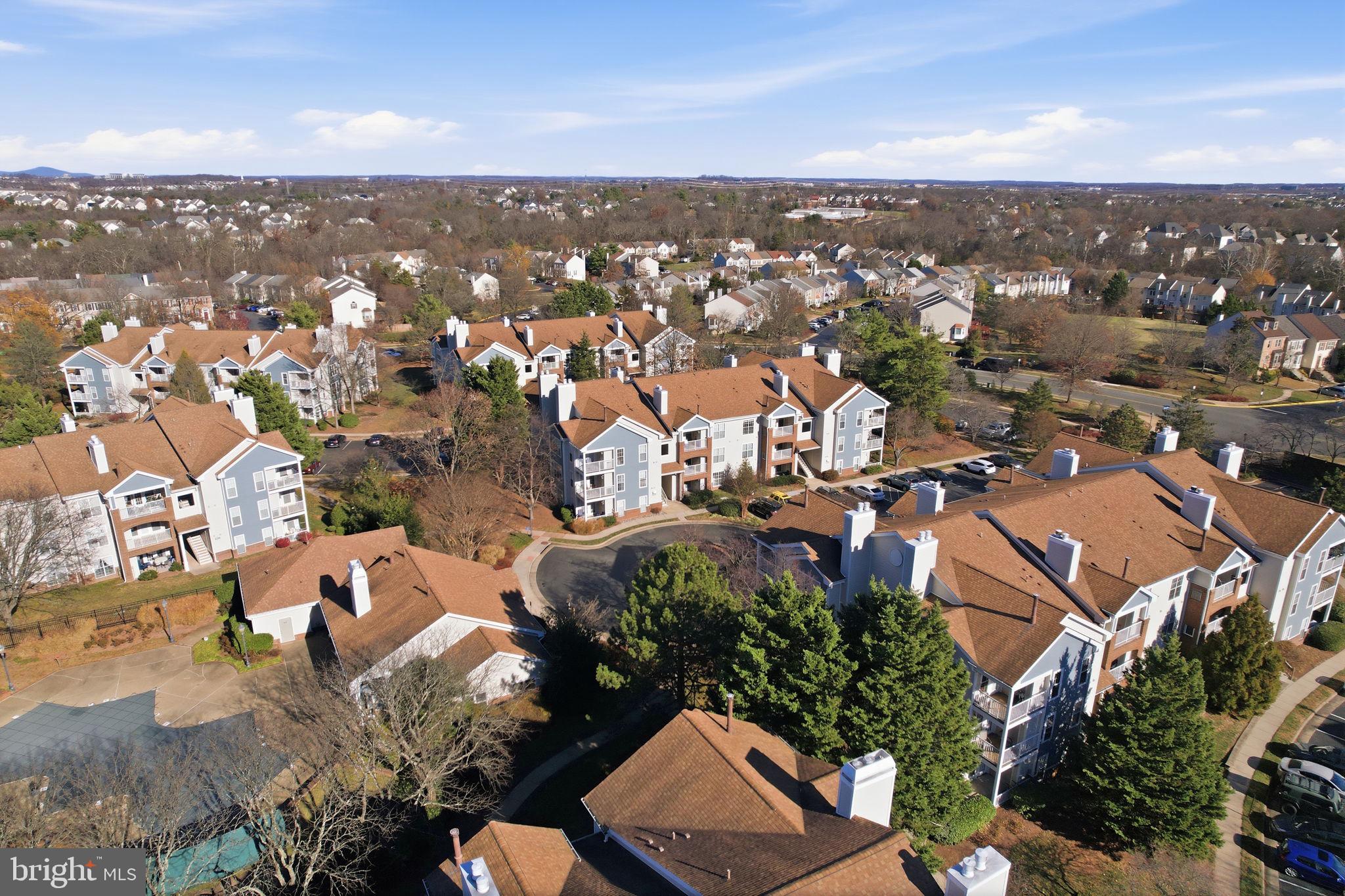 20963 Timber Ridge Terrace, Unit 103 Ashburn, VA 20147 - Photo 31 of 32 an aerial view of a city