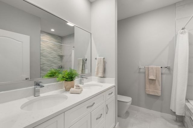 a bathroom with a bath tub