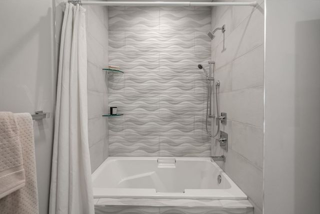 a close view of a washer and dryer in a utility room