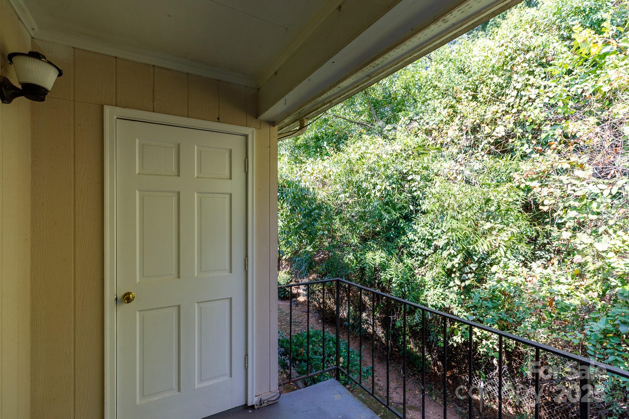 1792 Ebenezer Road, Unit G Rock Hill, SC 29732 - Photo 19 of 28 a view of a balcony with wooden floor