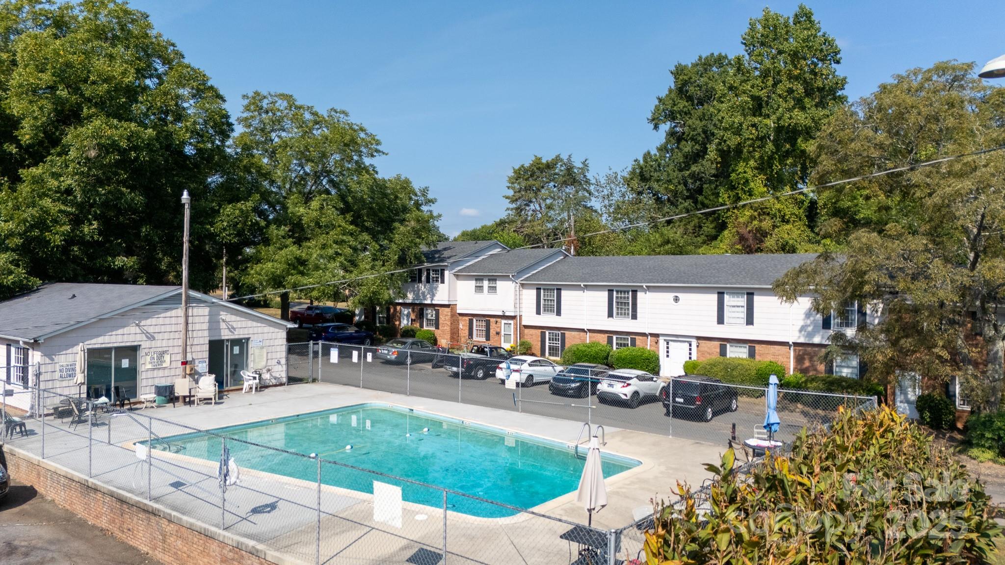1792 Ebenezer Road, Unit G Rock Hill, SC 29732 - Photo 22 of 28 a front view of a house with garden and patio