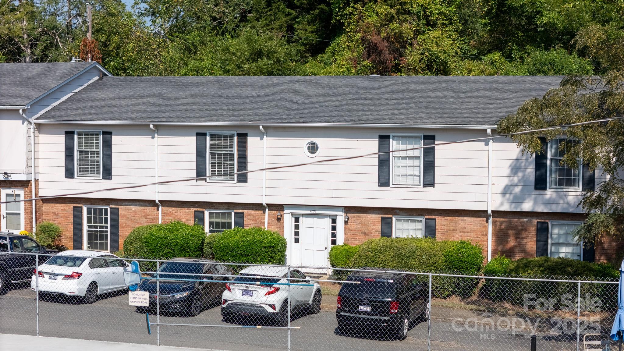 1792 Ebenezer Road, Unit G Rock Hill, SC 29732 - Photo 24 of 28 a car parked in front of a houses