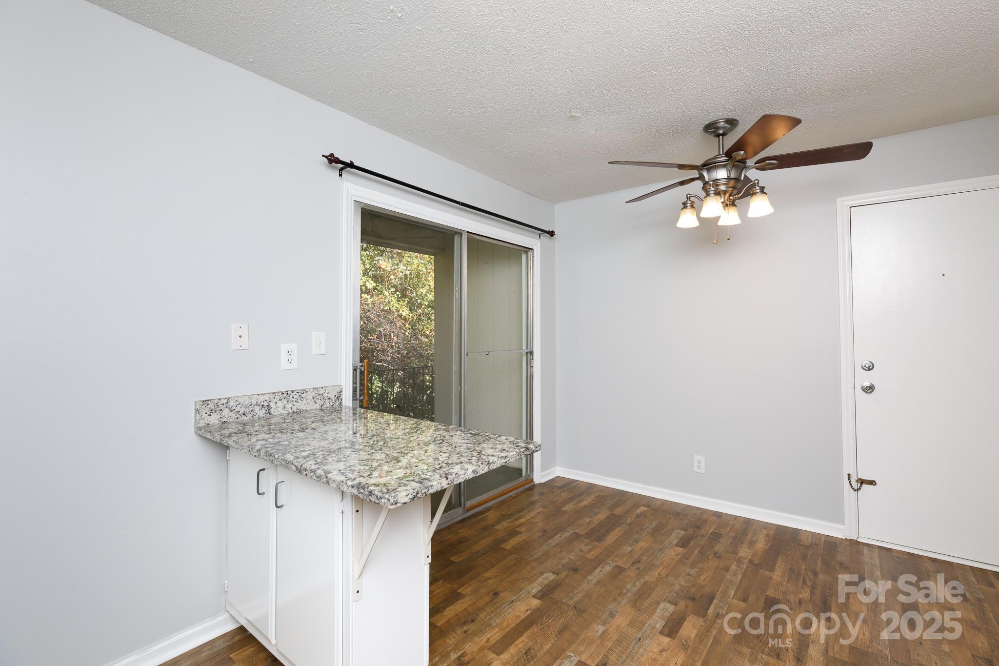 1792 Ebenezer Road, Unit G Rock Hill, SC 29732 - Photo 6 of 28 a bathroom with a granite countertop sink and a mirror