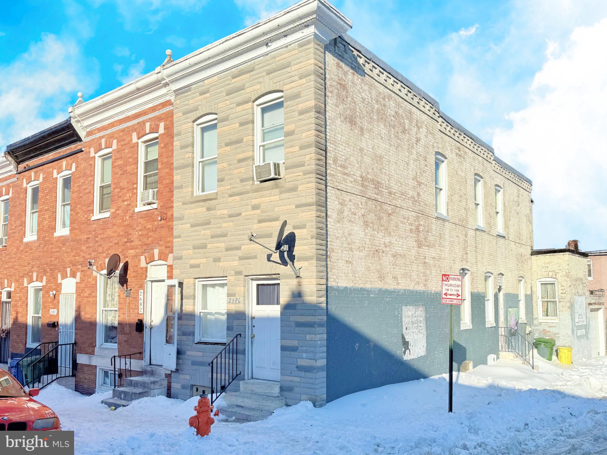 2680 St Benedict Street Baltimore, MD 21223 - Photo 27 of 27 a front view of a building with street view