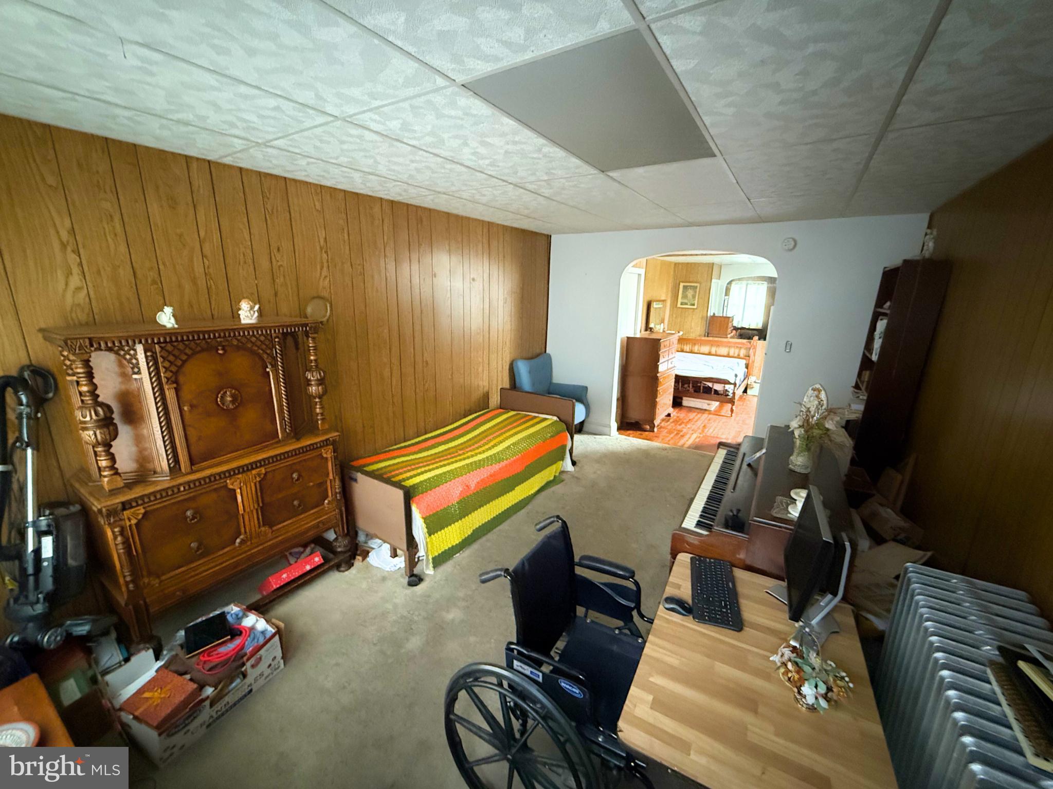 2680 St Benedict Street Baltimore, MD 21223 - Photo 3 of 27 a room with furniture a air conditioner and a window