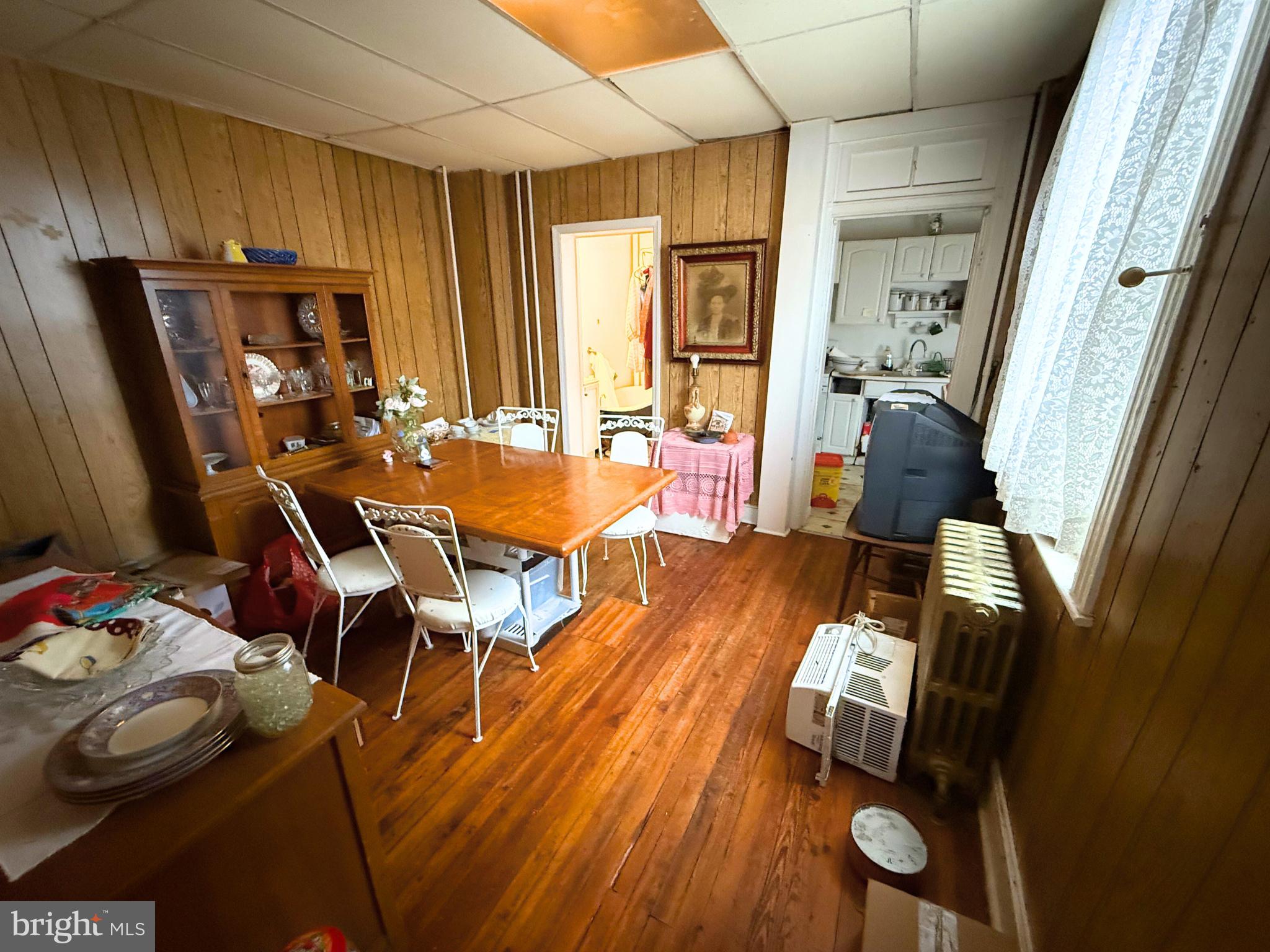 2680 St Benedict Street Baltimore, MD 21223 - Photo 9 of 27 a view of a workspace with furniture and a window