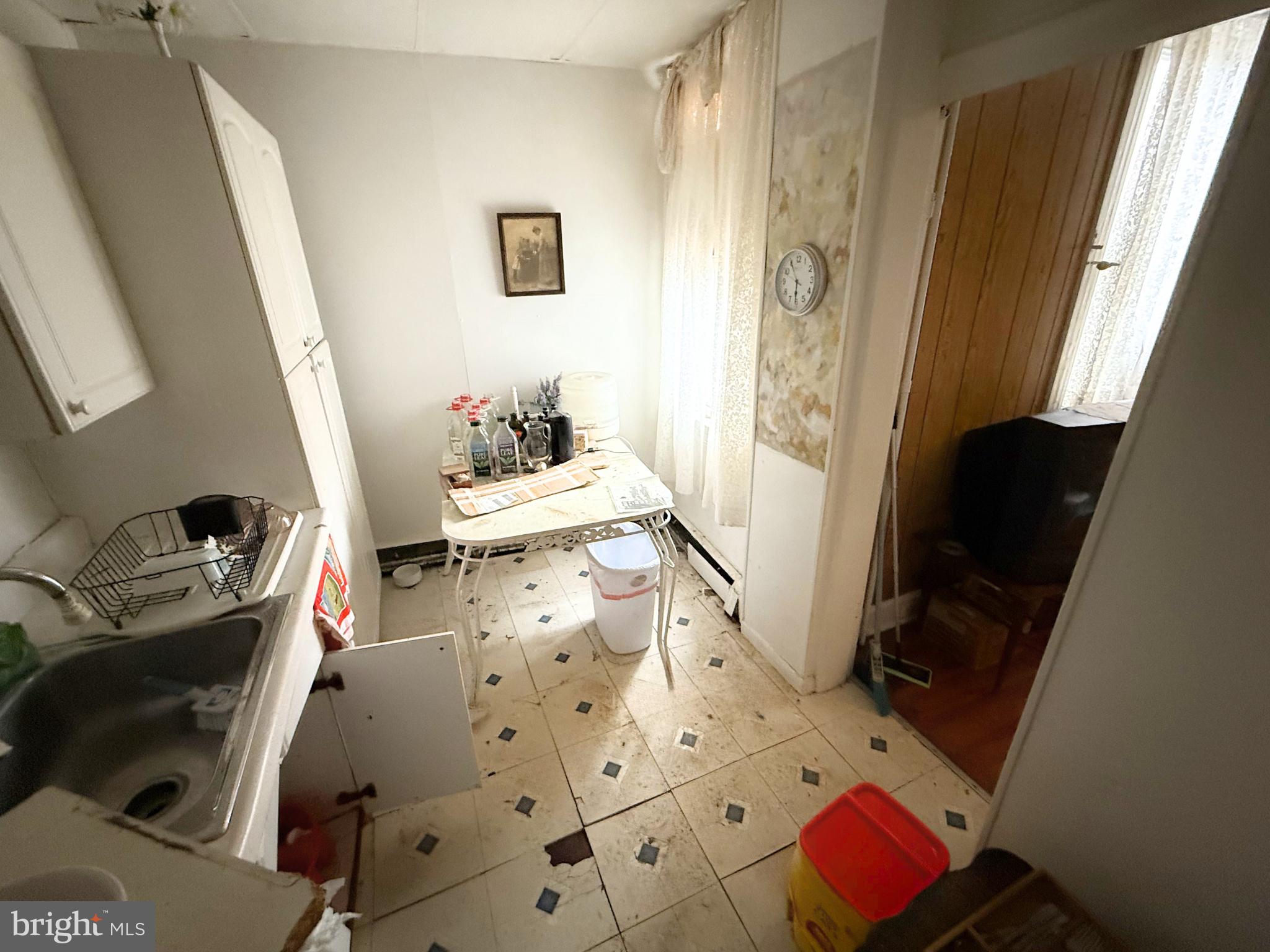 2680 St Benedict Street Baltimore, MD 21223 - Photo 10 of 27 a bedroom with furniture and a window