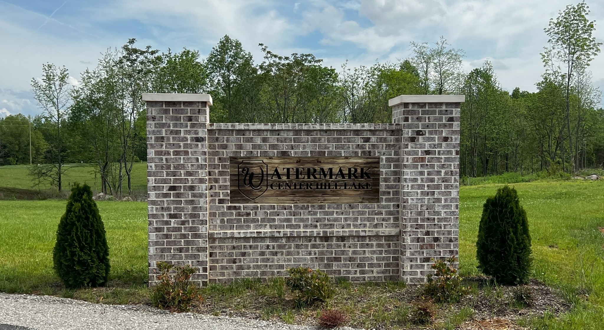a brick building with a yard