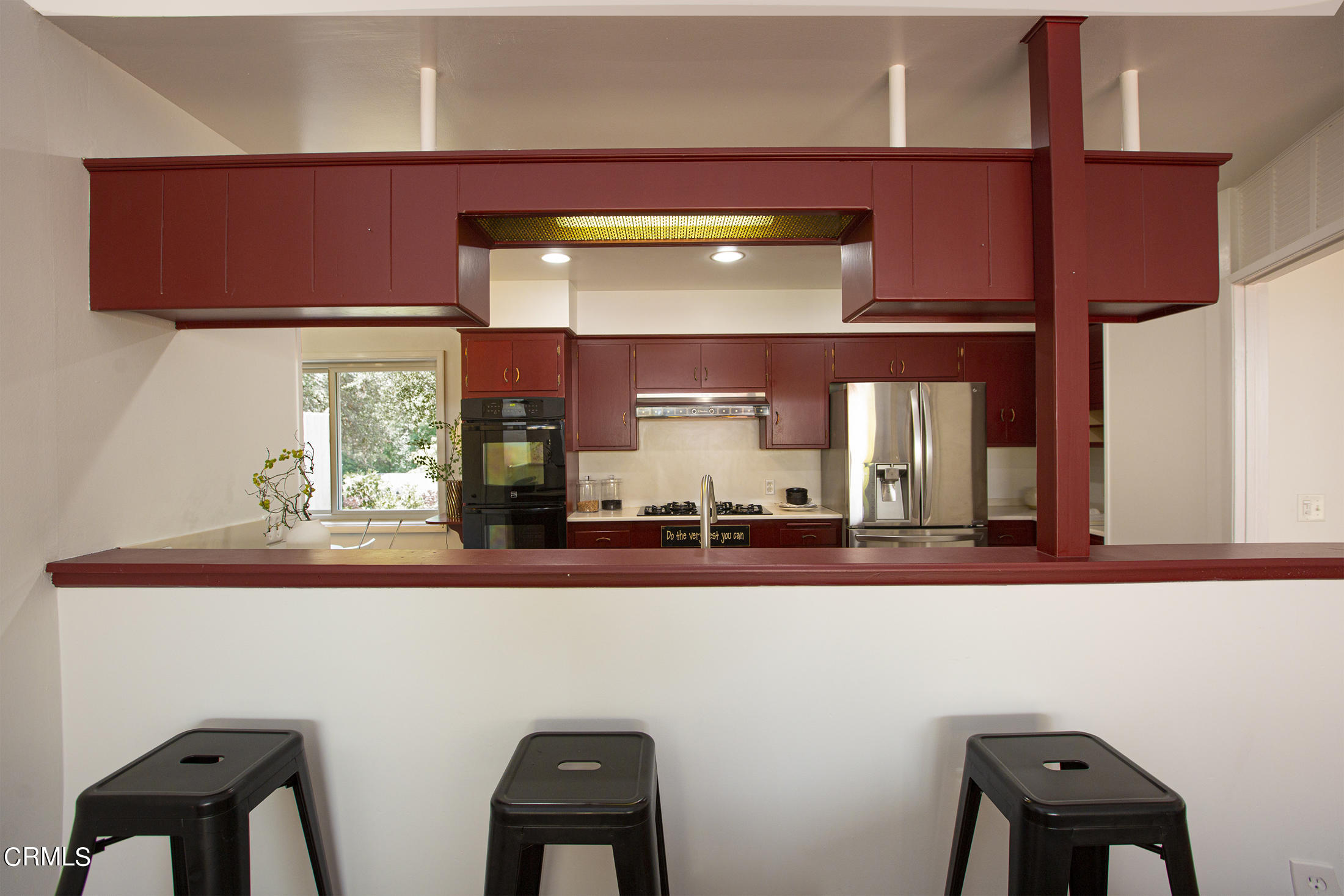 4175 Chevy Chase Drive La Canada Flintridge, CA 91011 - Photo 15 of 40 a kitchen with cabinets and wooden floor