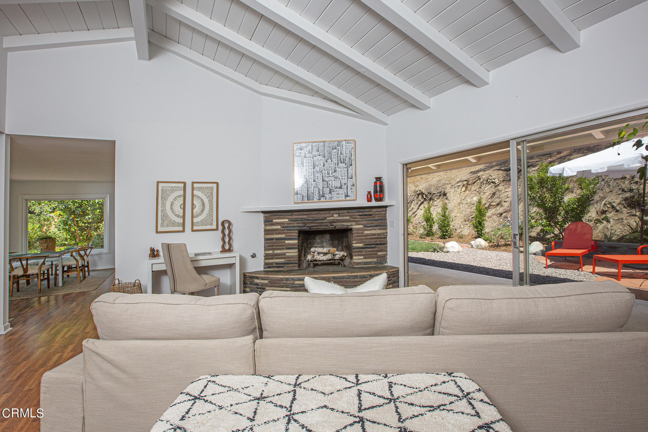 4175 Chevy Chase Drive La Canada Flintridge, CA 91011 - Photo 20 of 40 a living room with furniture a fireplace and a large window